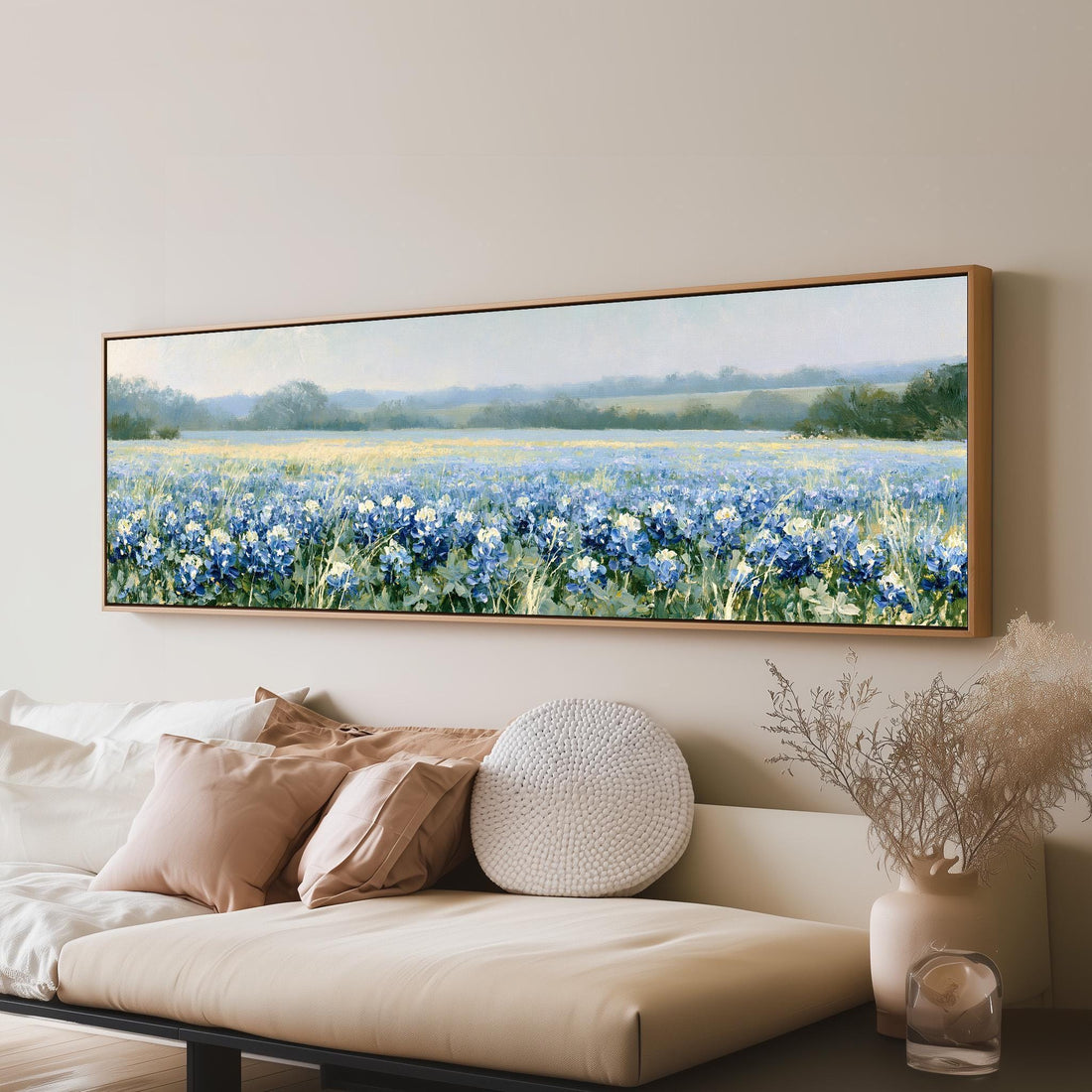 Field of bluebonnets long horizontal canvas print above a sofa in a living room