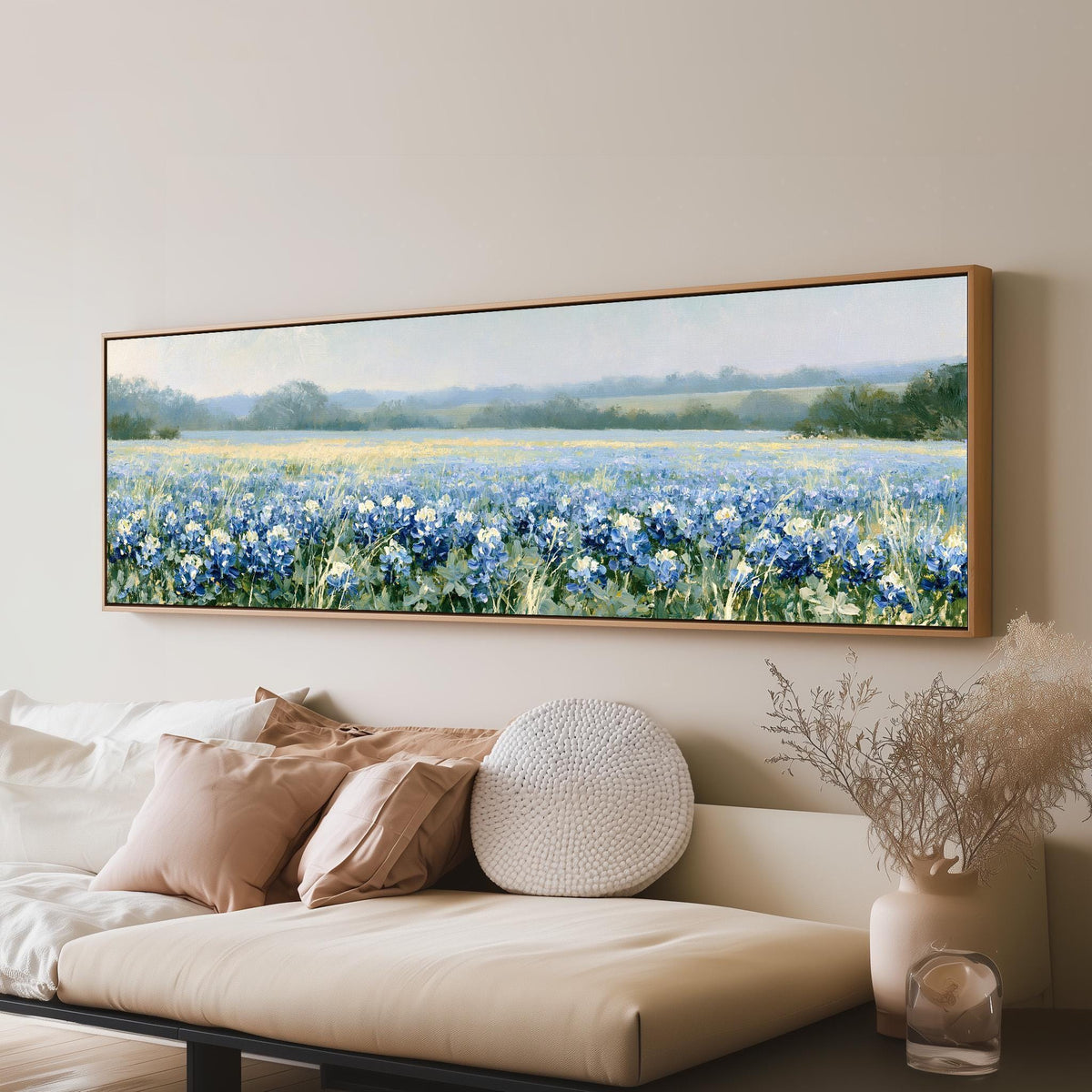 Field of bluebonnets long horizontal canvas print above a sofa in a living room