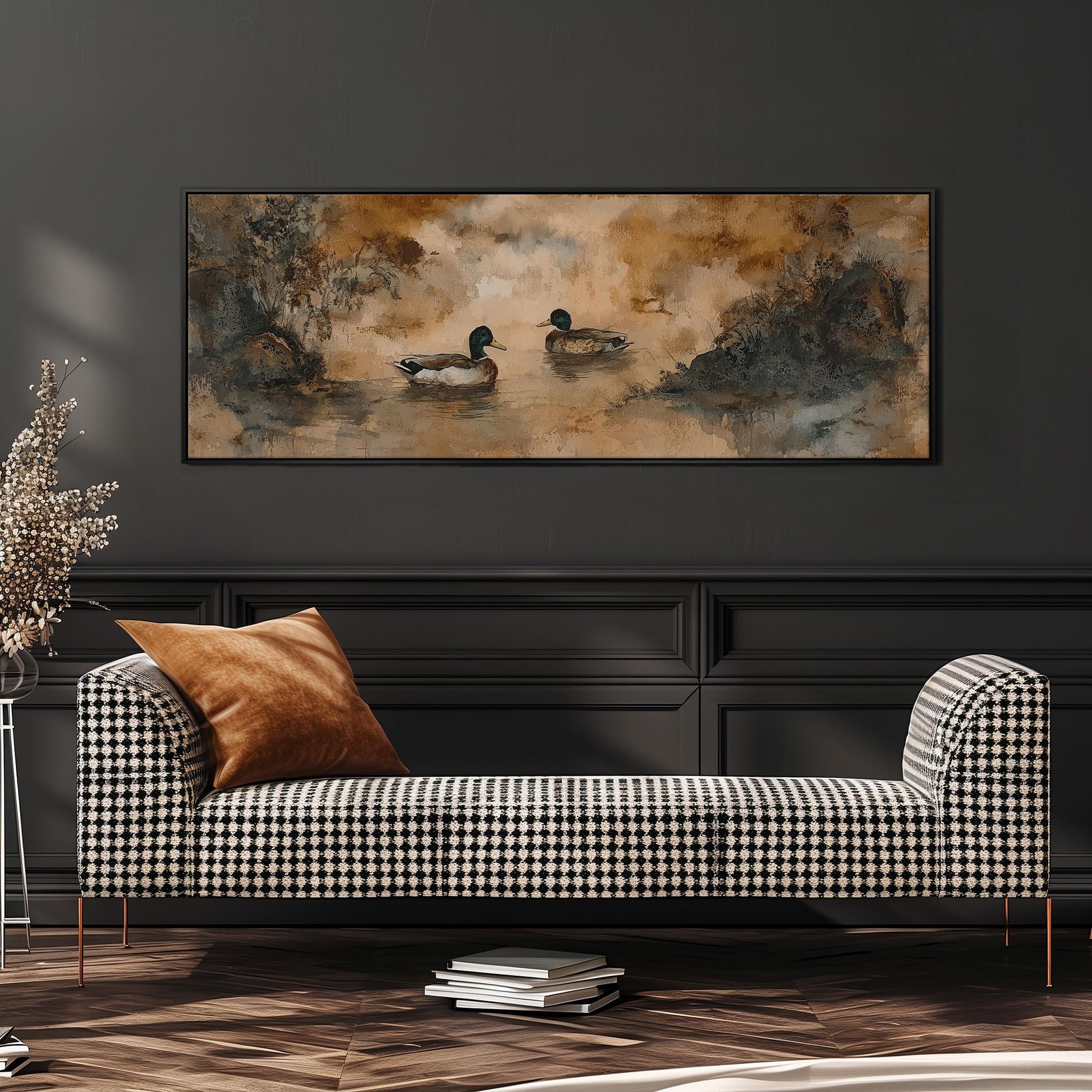 a black and white checkered sofa with a brown throw pillow, set against a dark wall with a large painting of ducks in a pond hanging above it.