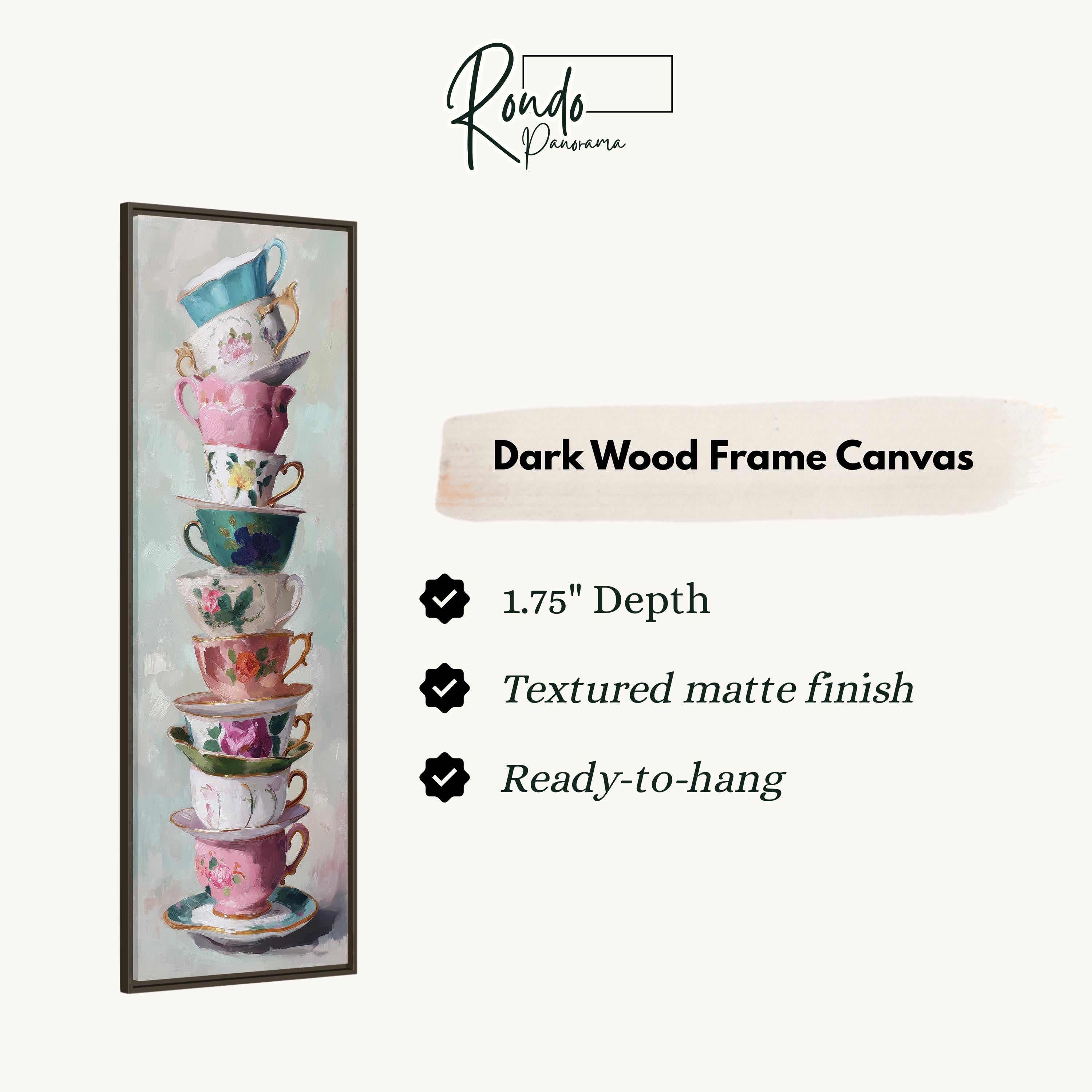 a tall stack of colorful teacups, with a dark wood frame canvas hanging on a wall.