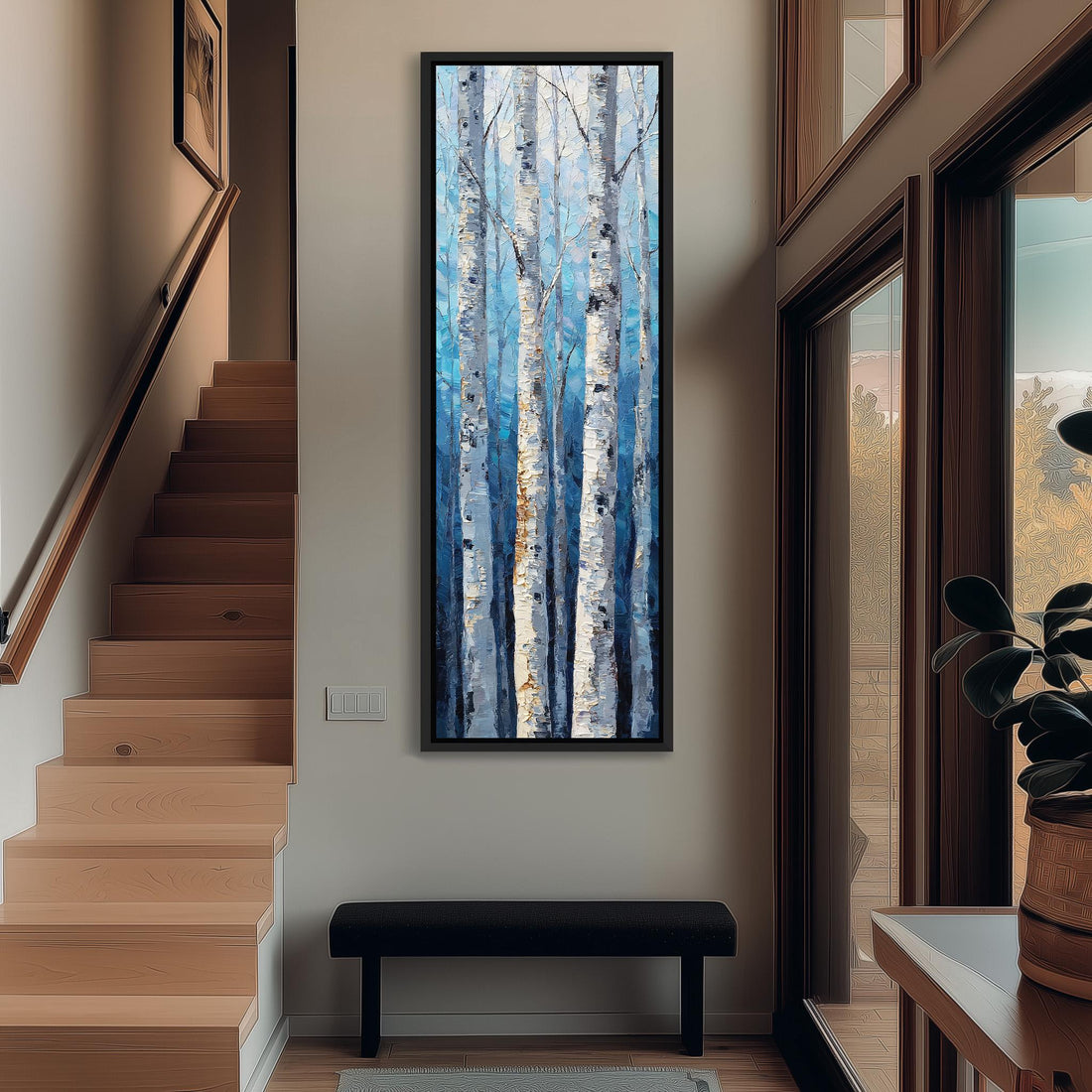 a large painting of birch trees with white bark, hanging on a wall in a room with a wooden cabinet and a vase of flowers.