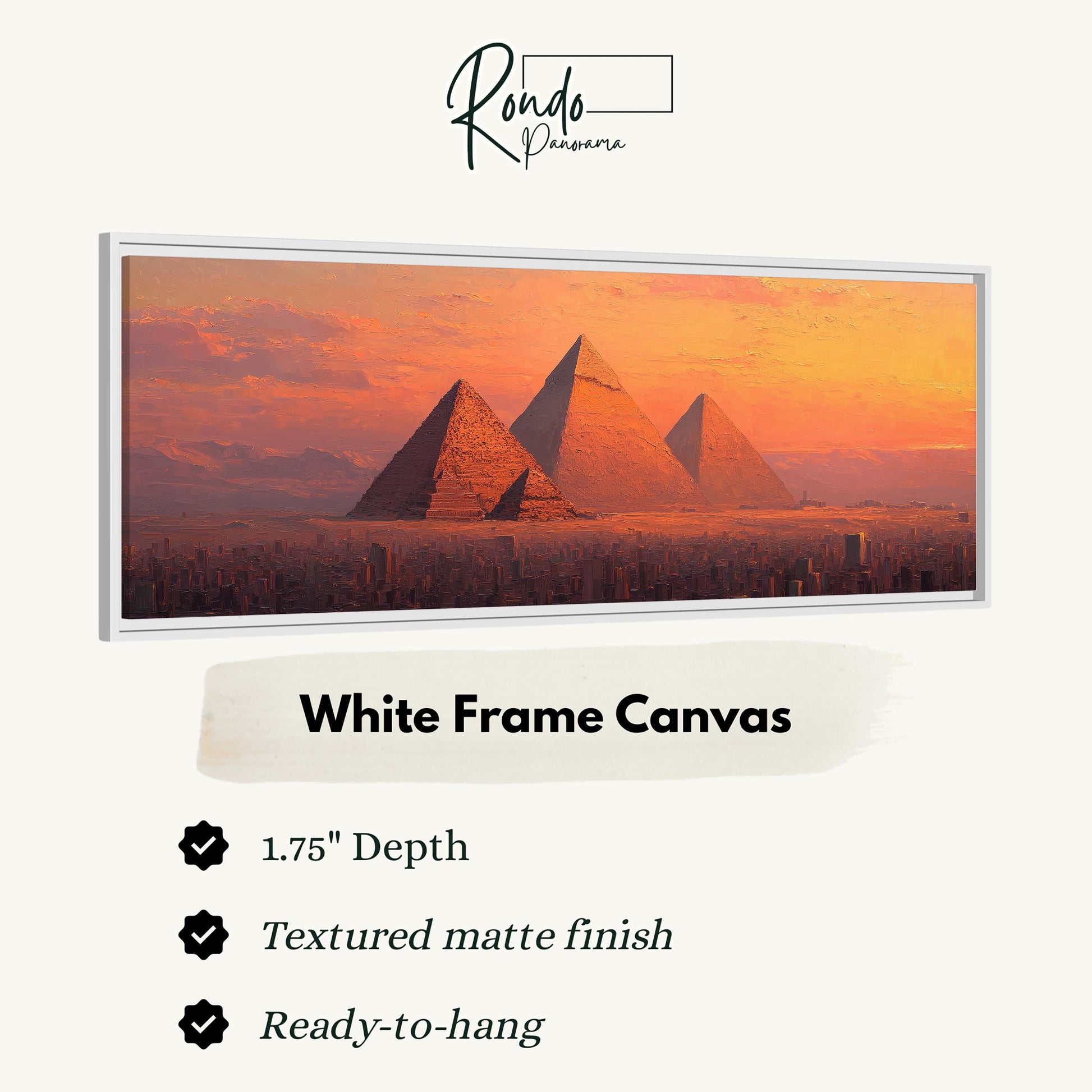 a large white frame canvas depicting the iconic pyramids of Giza against a sunset sky.