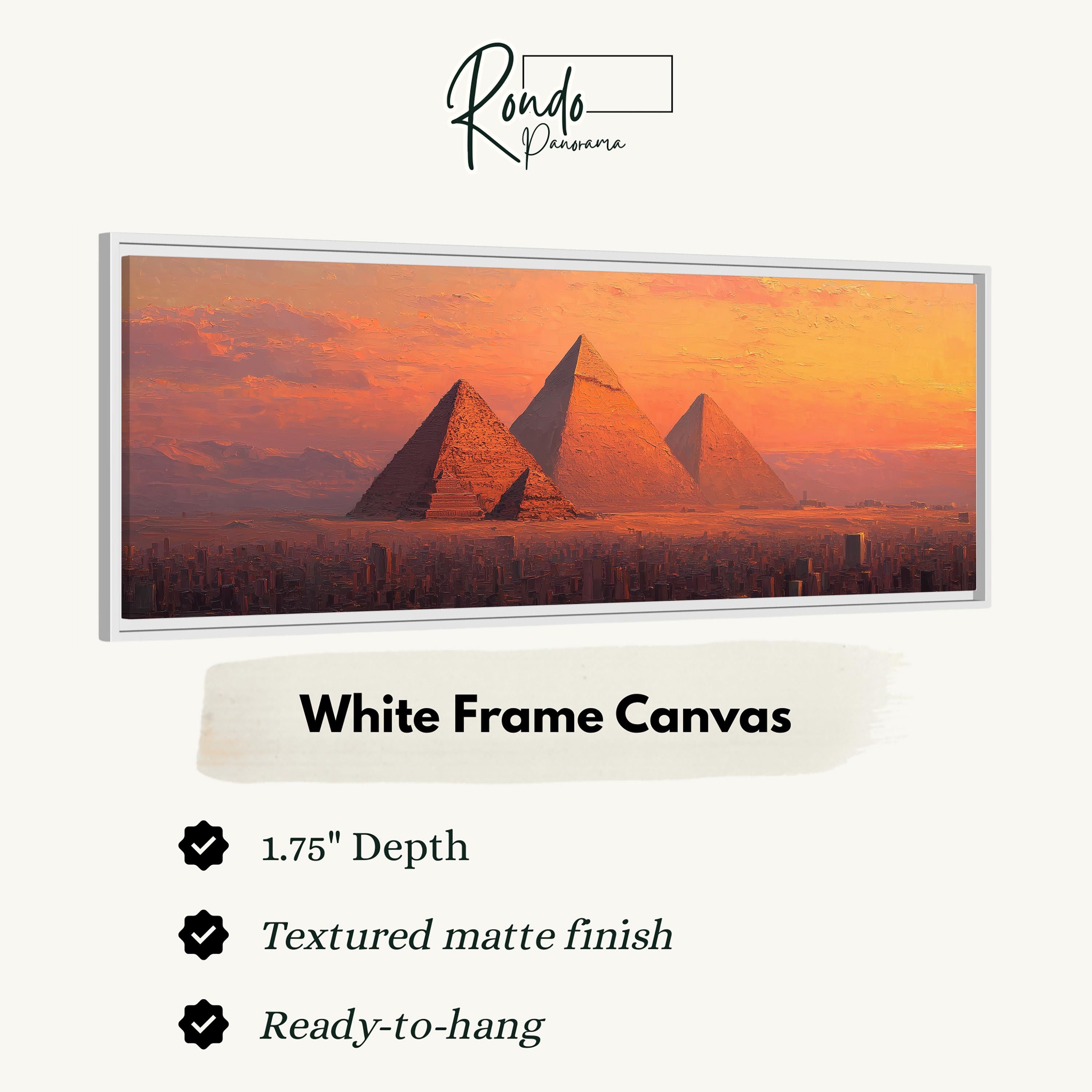 a large white frame canvas depicting the iconic pyramids of Giza against a sunset sky.
