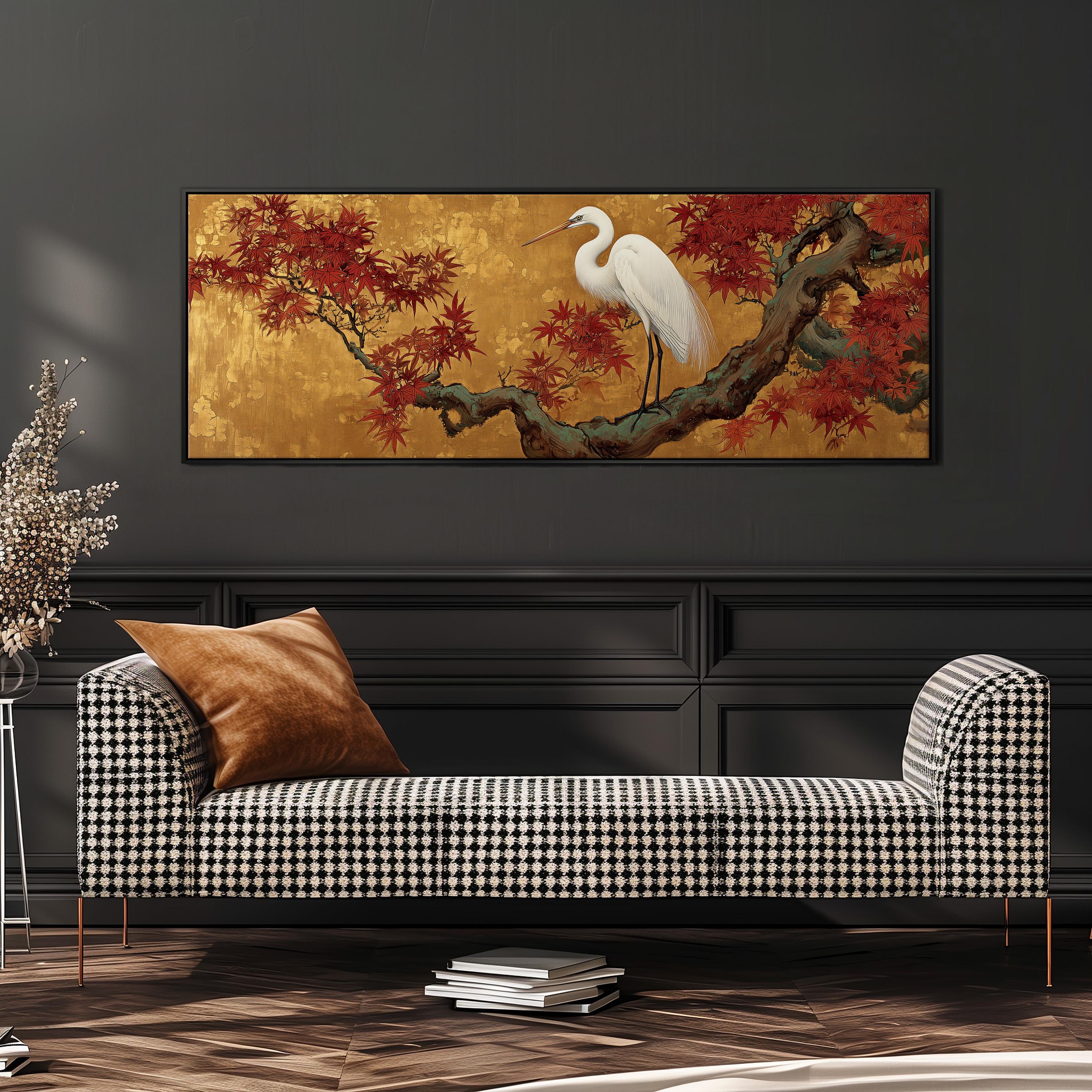 a large painting of a white heron perched on a branch with red leaves, hanging on a wall above a black and white checkered sofa.