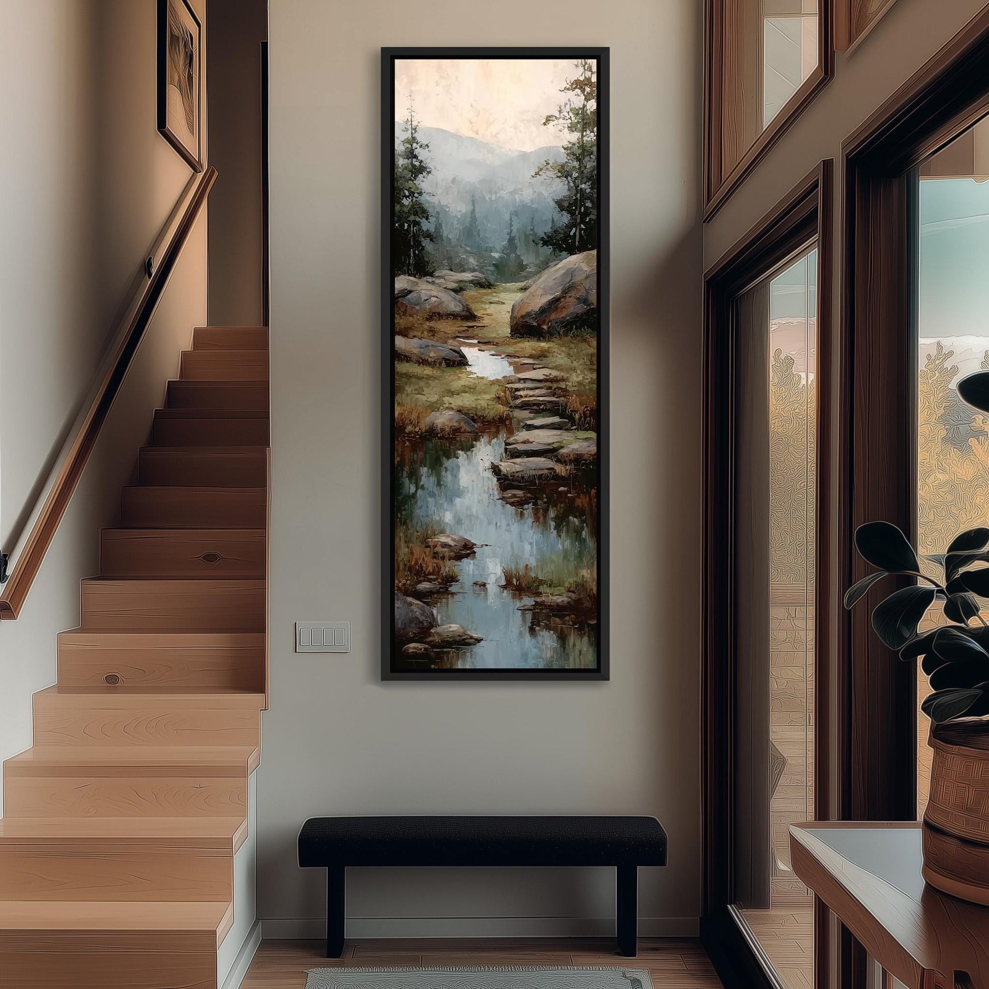 a hallway with a large painting of a mountain landscape hanging on the wall. The painting depicts a serene scene with a stream and rocks, creating a peaceful atmosphere. The hallway has wooden stairs leading up to the painting, and a bench is placed in front of it. The overall scene is well-lit and inviting, with the painting serving as a focal point in the space.