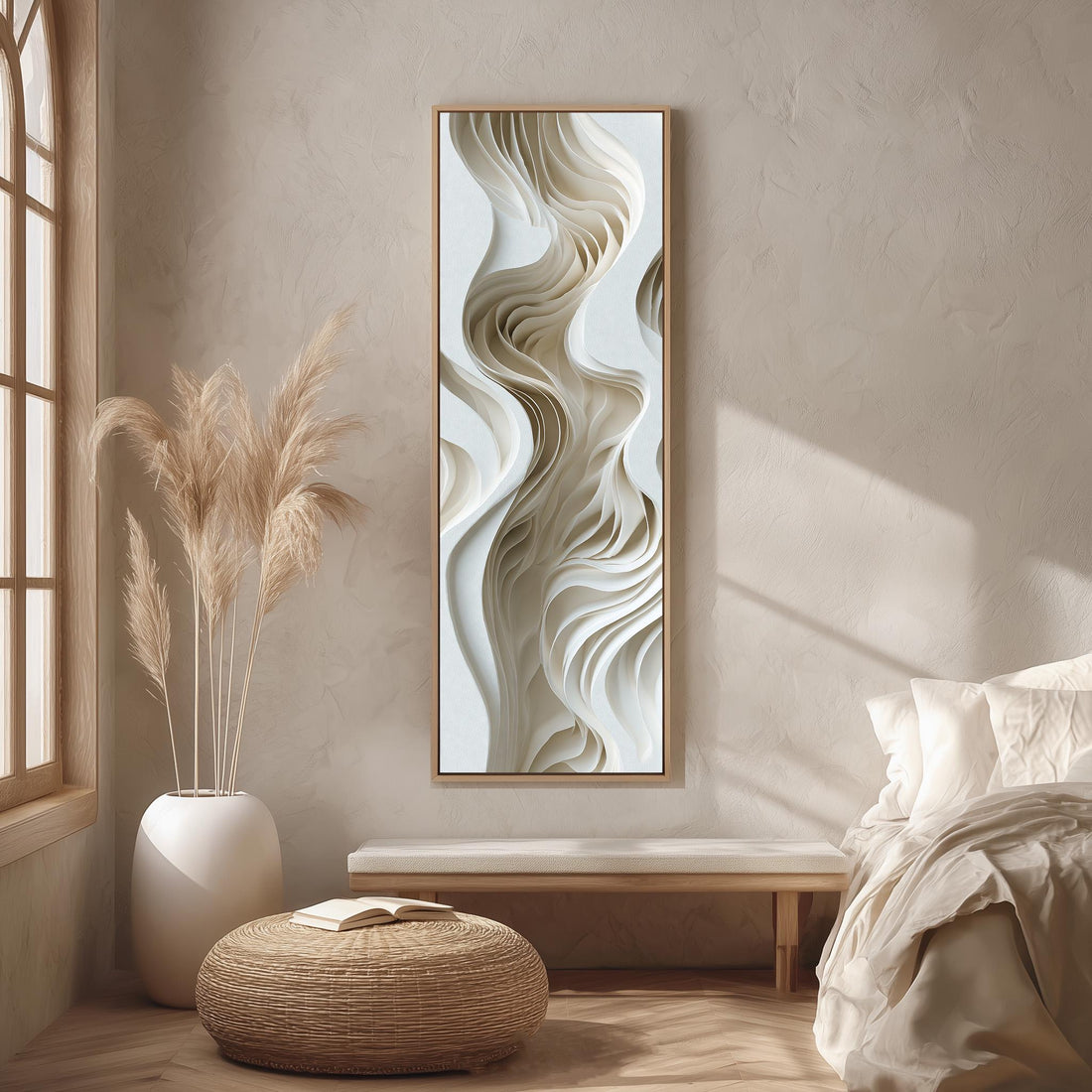 a modern kitchen with a large abstract artwork hanging on the wall. The artwork has a swirling, organic design in shades of white and beige, creating a sense of movement and fluidity. The kitchen is well-lit, with a pendant light hanging above the countertop and a wooden cabinet visible on the left side of the image.