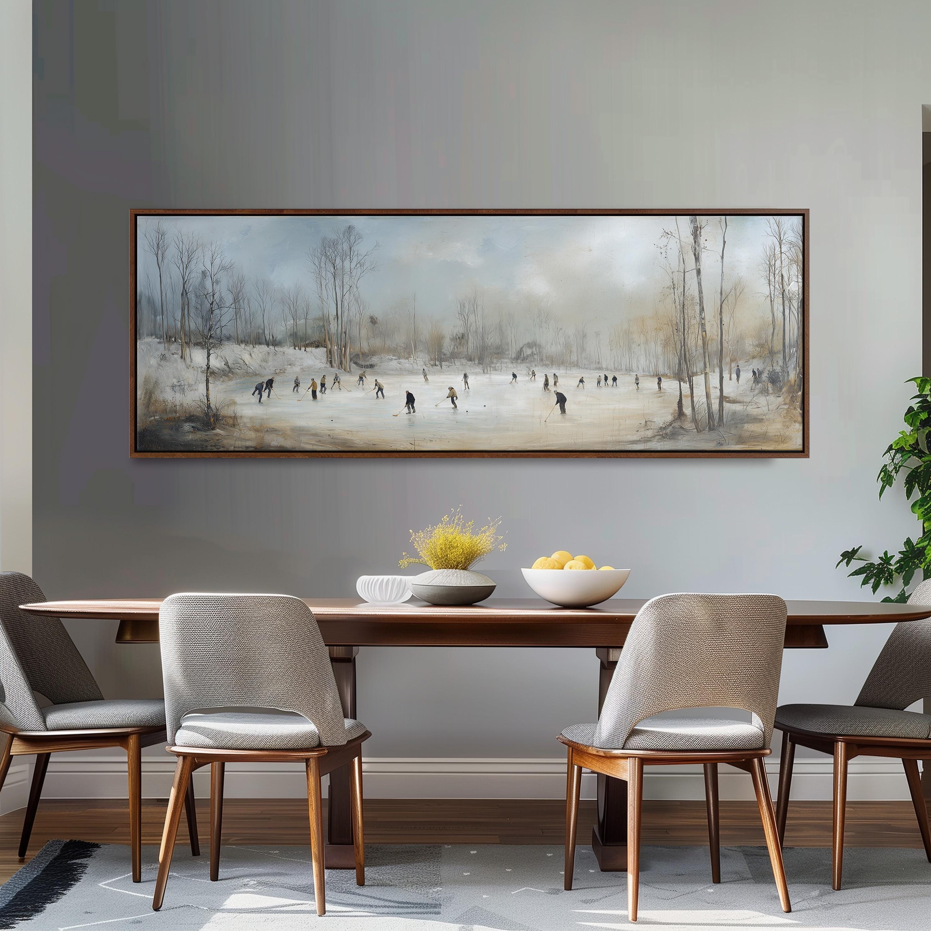 a large painting of people ice skating on a frozen lake, hanging on a wall above a wooden dining table with four chairs.