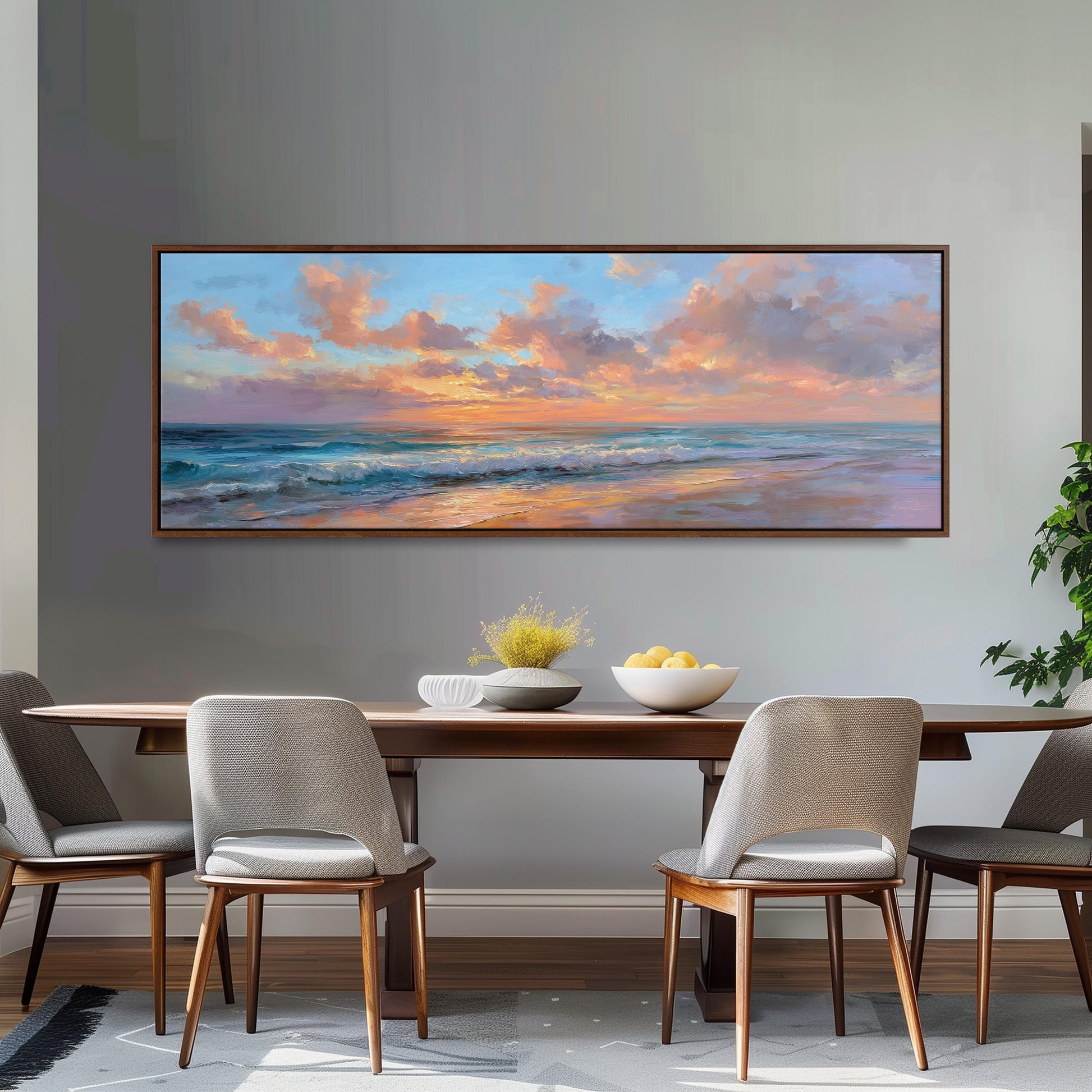 a large painting of a serene ocean scene with a sunset over the water, hanging on a wall above a wooden dining table with four chairs.