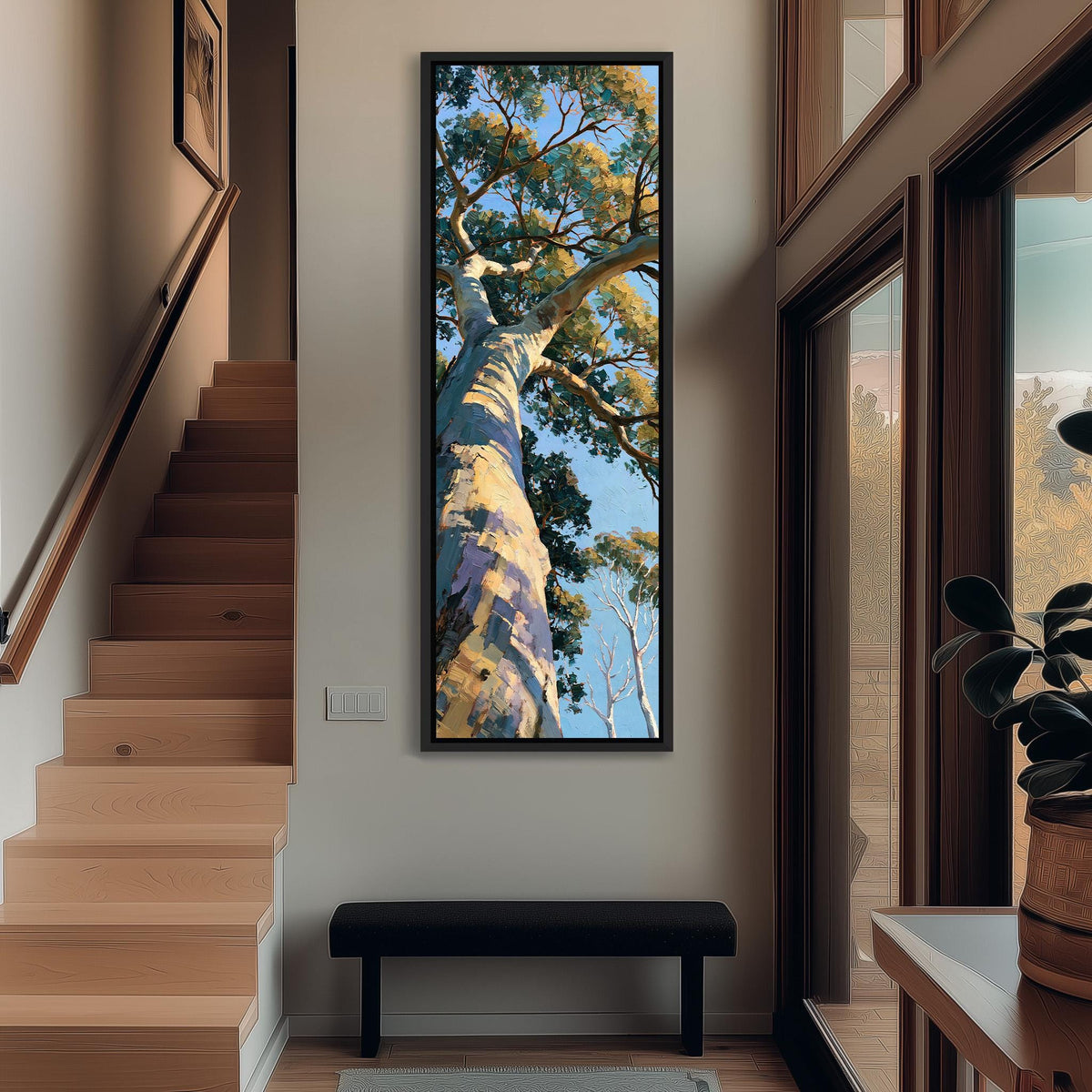 Gum tree trunk rising into a sunlit canopy tall narrow canvas print beside a staircase in an entryway