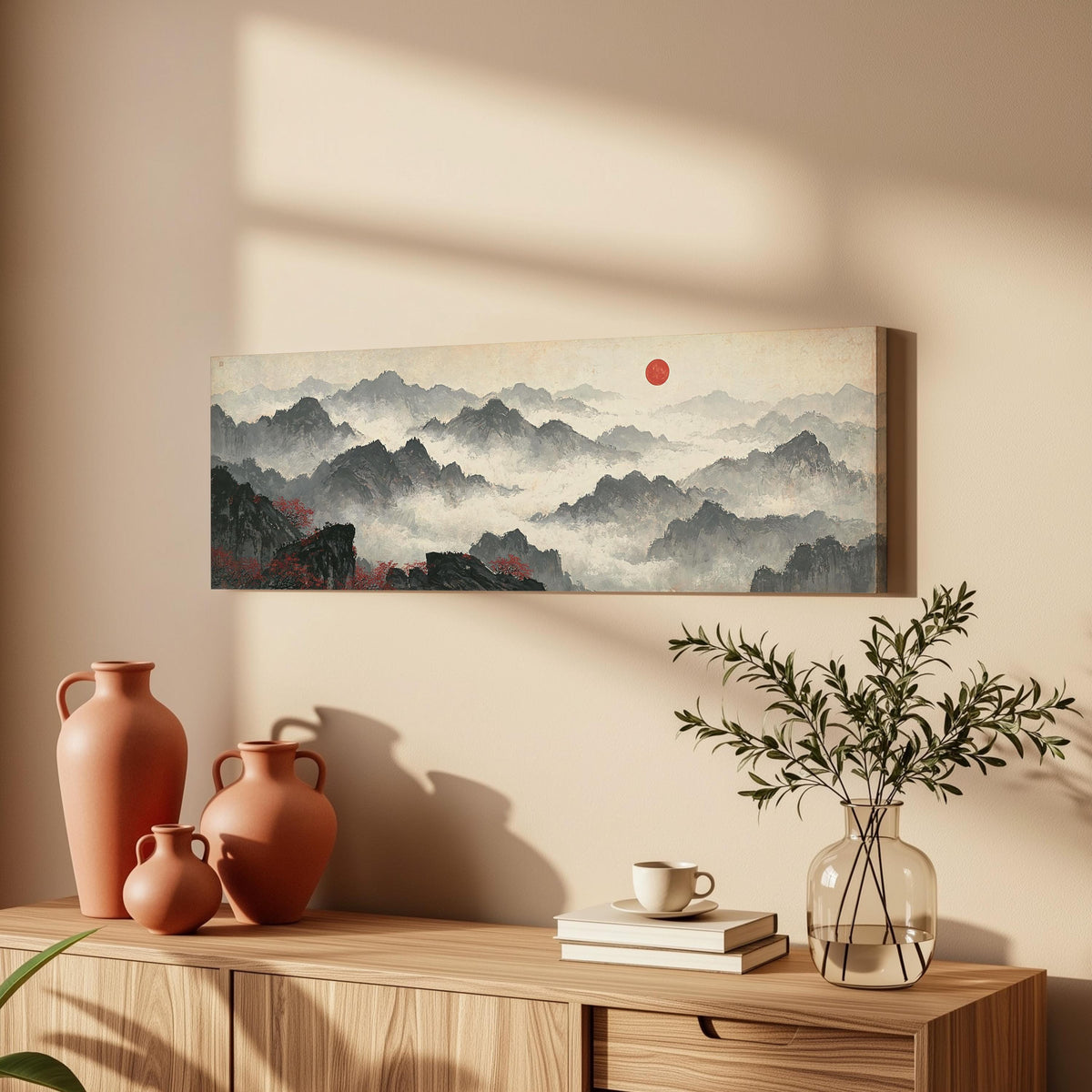 Misty ink mountains under a red sun long horizontal canvas print above a wooden sideboard