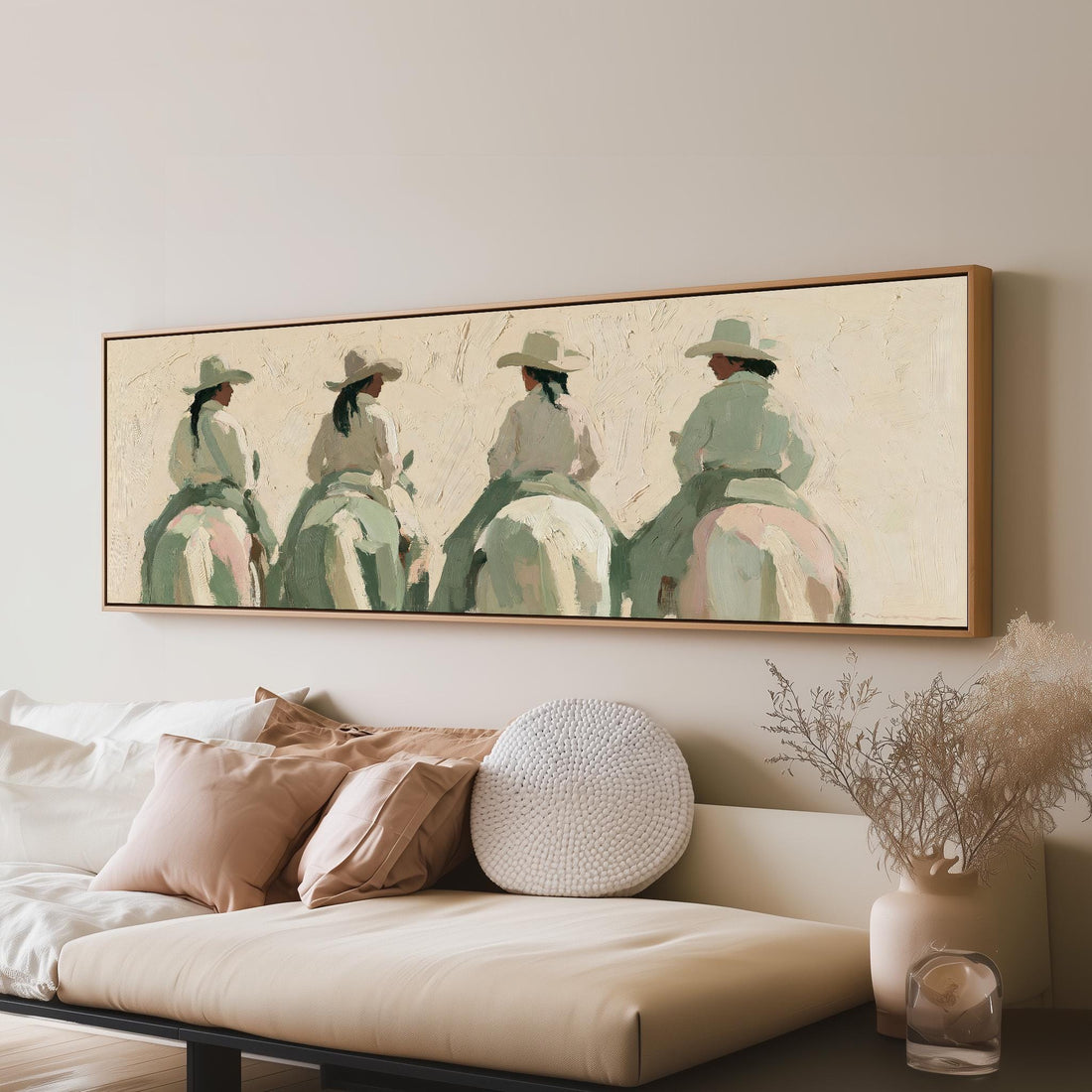 Cowgirl trail riders long horizontal canvas print above a sofa in a living room
