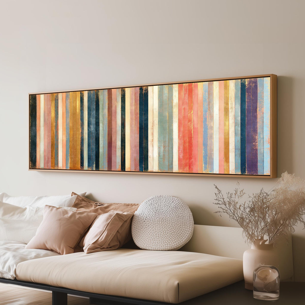 Blush, navy and gold gilded stripes long horizontal canvas print above a sofa in a living room
