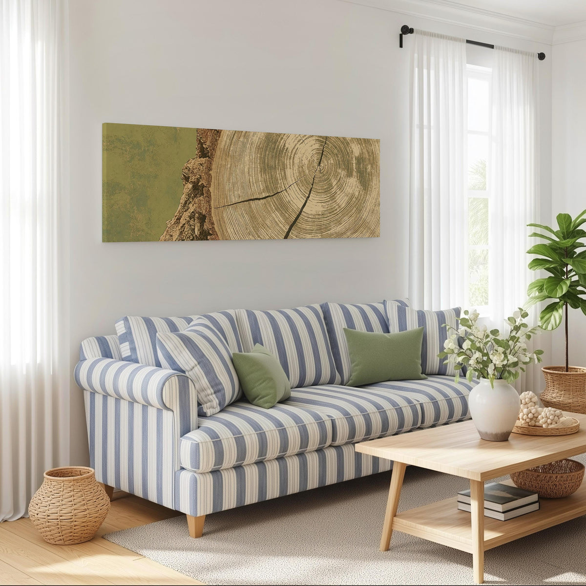 Golden tree ring wood grain long horizontal canvas print above a striped sofa in a coastal living room