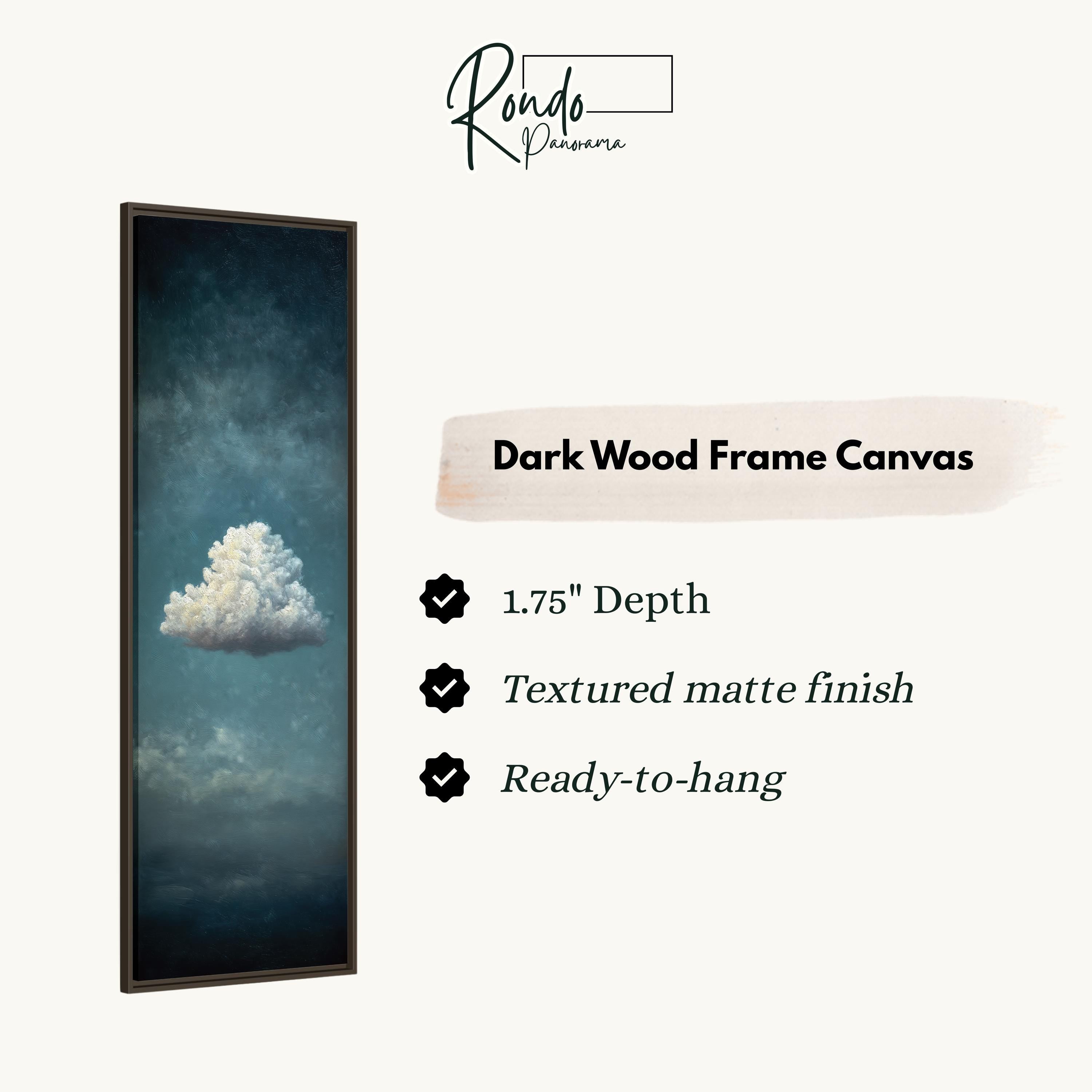 The image is a dark wood frame canvas depicting a single white cloud against a dark blue sky.