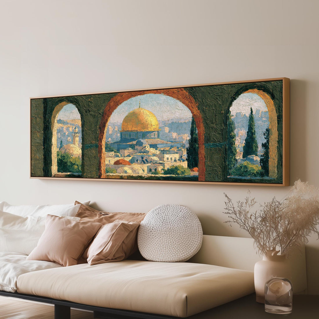 Dome of the Rock seen through stone arches long horizontal canvas print above a sofa in a living room