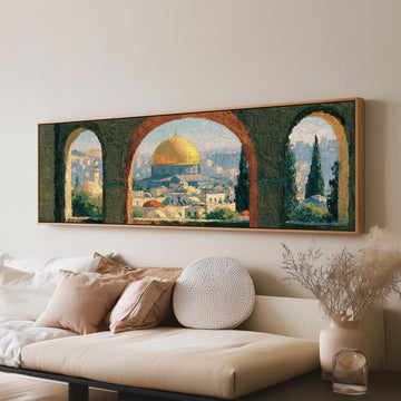 Dome of the Rock seen through stone arches long horizontal canvas print above a sofa in a living room