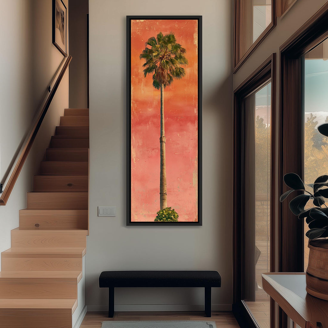 a large, framed painting of a palm tree hanging on a wall in a hallway.