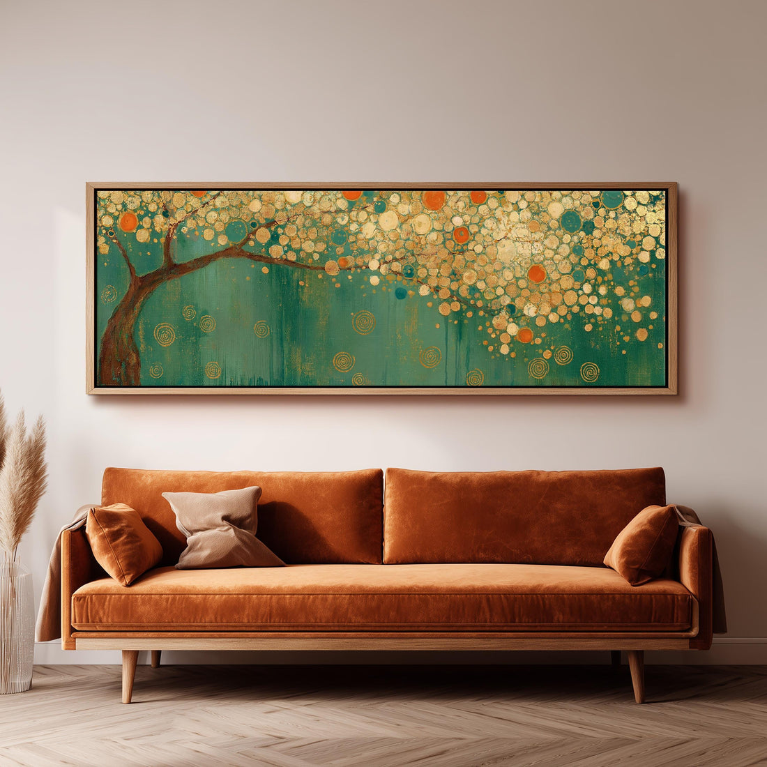 Klimt style tree with golden circles on teal long horizontal canvas print above a sofa in a living room