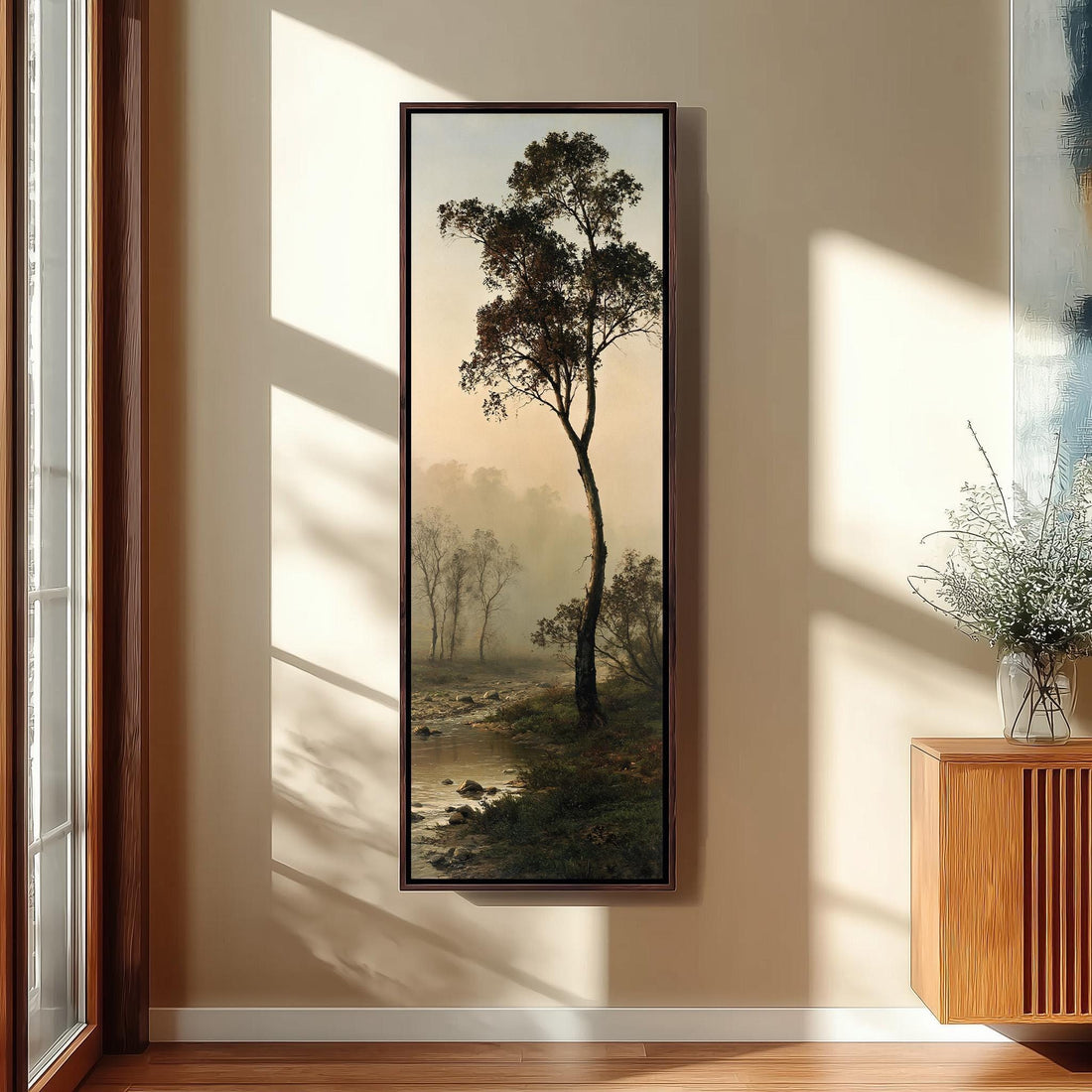 Lone tree beside a misty river long vertical canvas print in a sunlit living space
