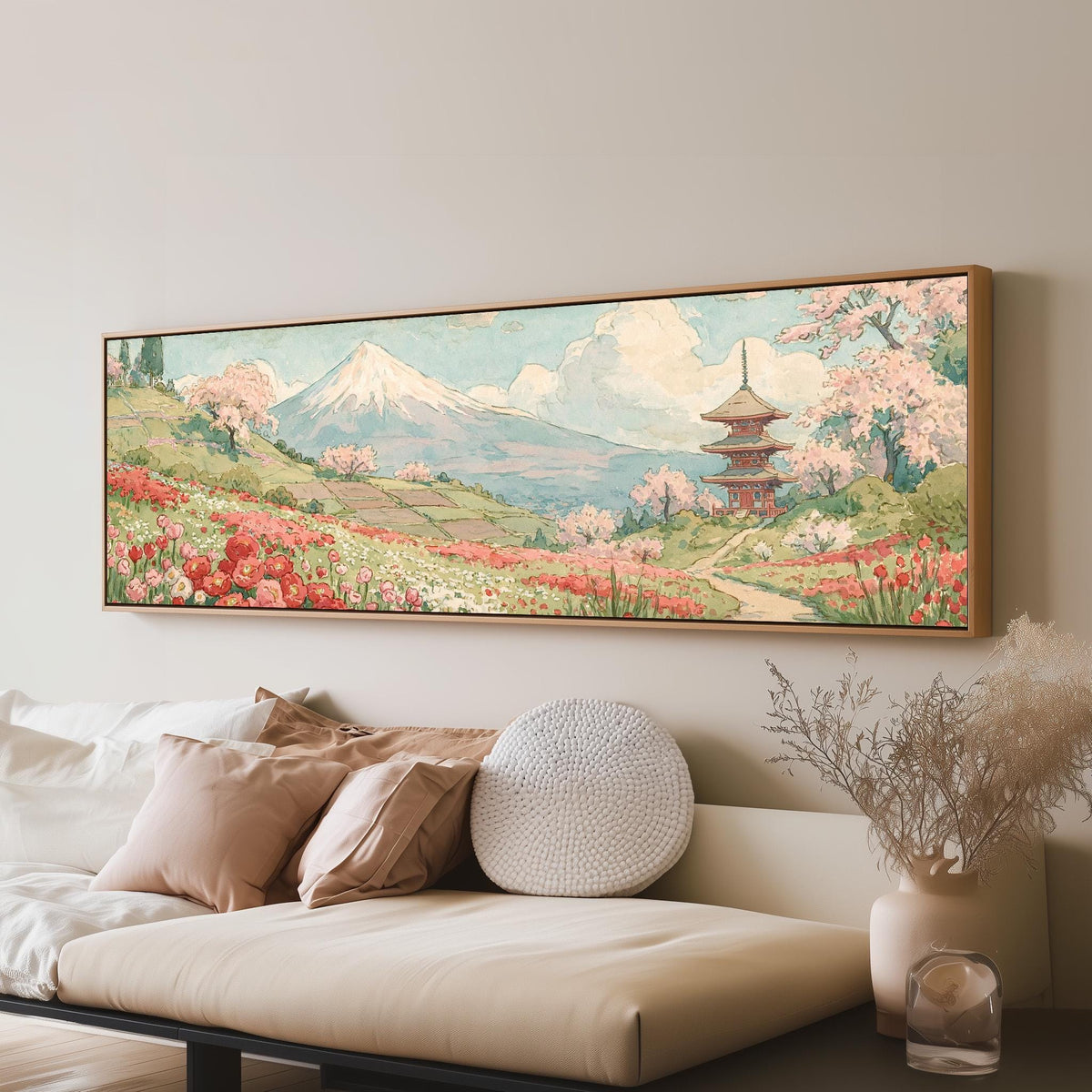 Mount Fuji with sakura and a pagoda long horizontal canvas print above a sofa in a living room