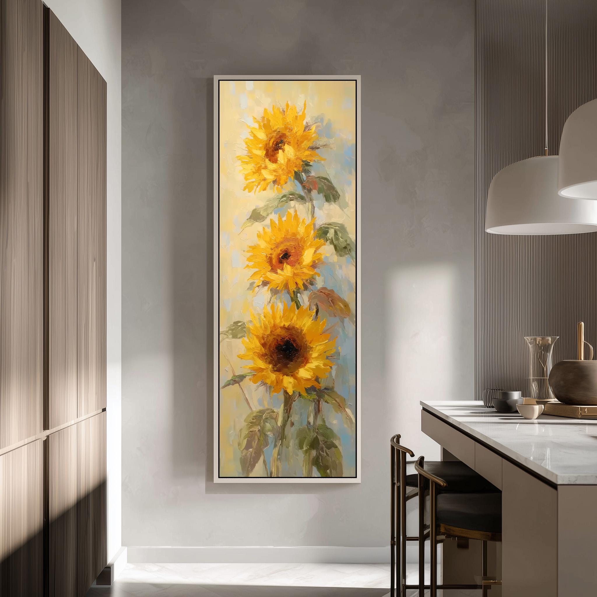 a large painting of three sunflowers hanging on a wall in a modern kitchen.