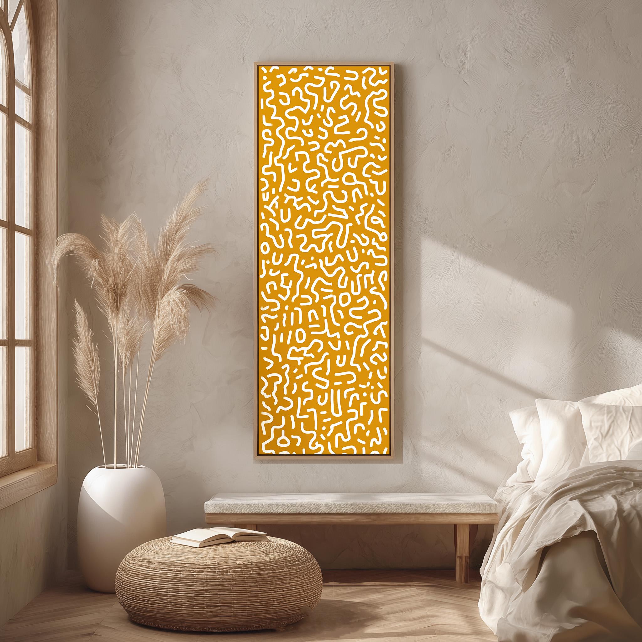 a minimalist bedroom interior with a large abstract painting featuring a yellow and white pattern hanging on the wall. The room has a bed, a white ottoman, and a potted plant, creating a serene and modern atmosphere.