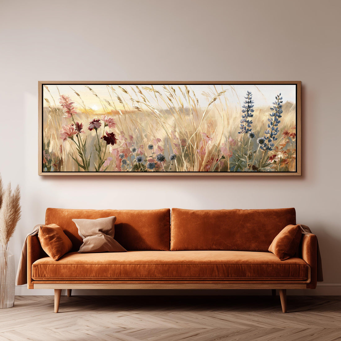 Golden wild grasses and lupins long horizontal canvas print above a sofa in a living room