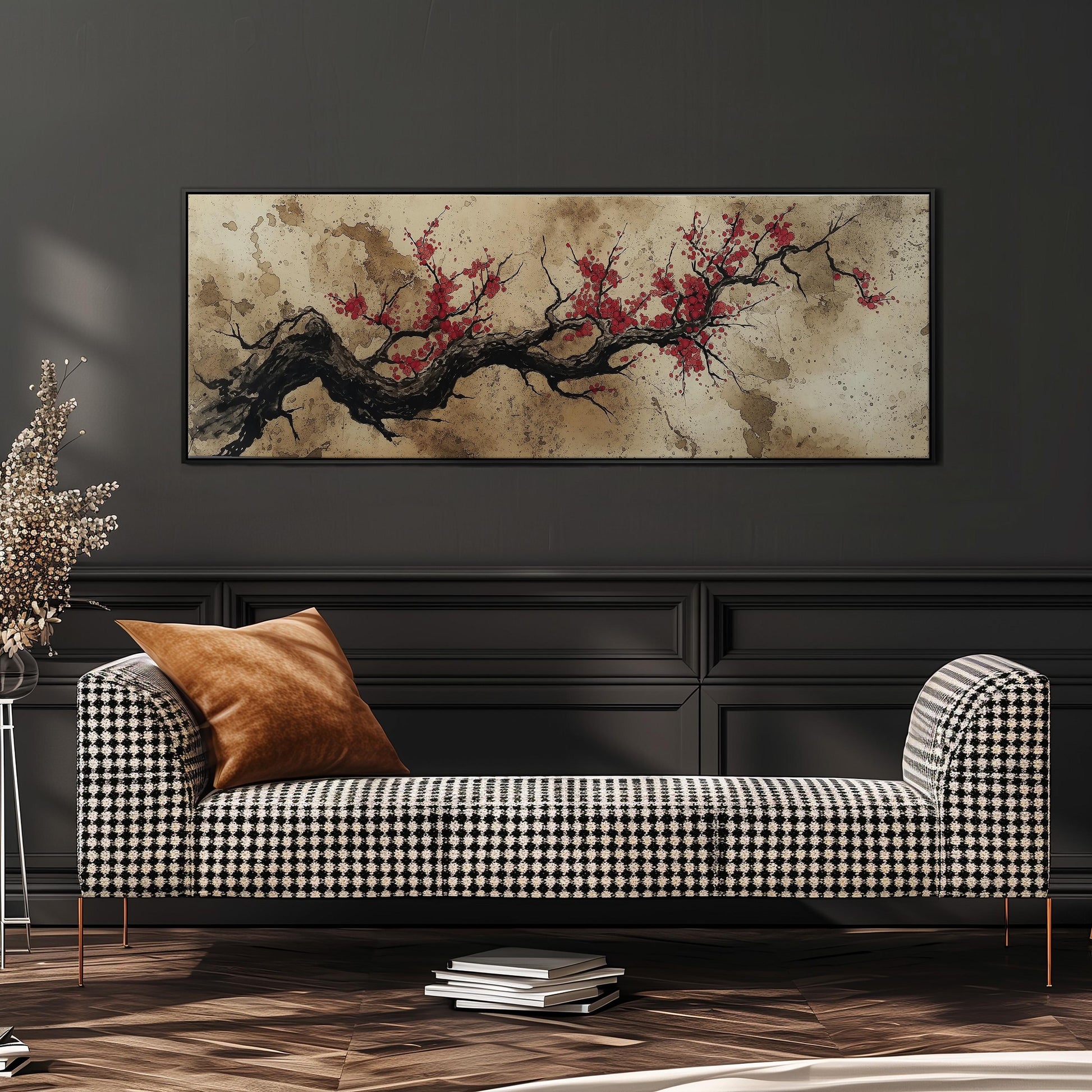 a black and white checkered sofa with a brown throw pillow, set against a dark wall with a large abstract painting hanging above it.