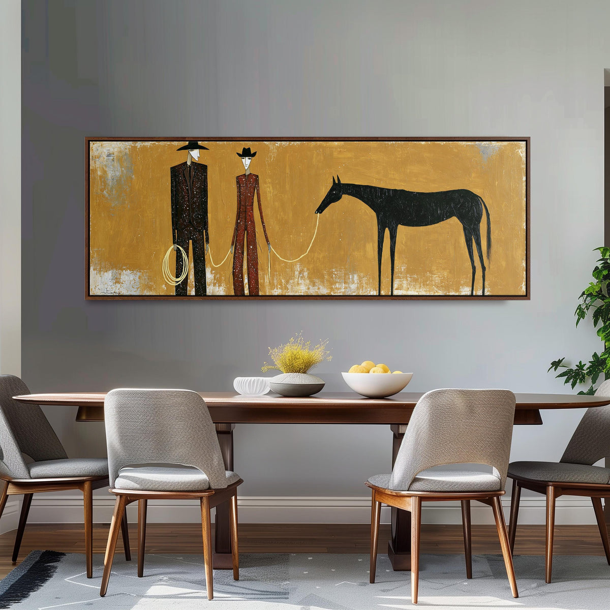 Two cowboys with a dark horse on gold long horizontal canvas print above a dining table