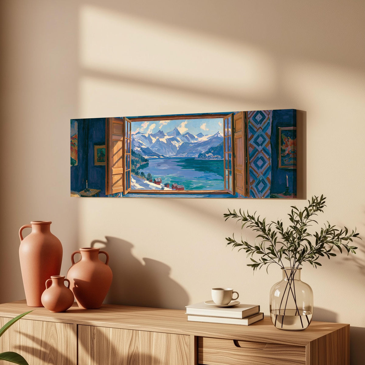 Snowy alpine lake seen through a window long horizontal canvas print above a wooden sideboard