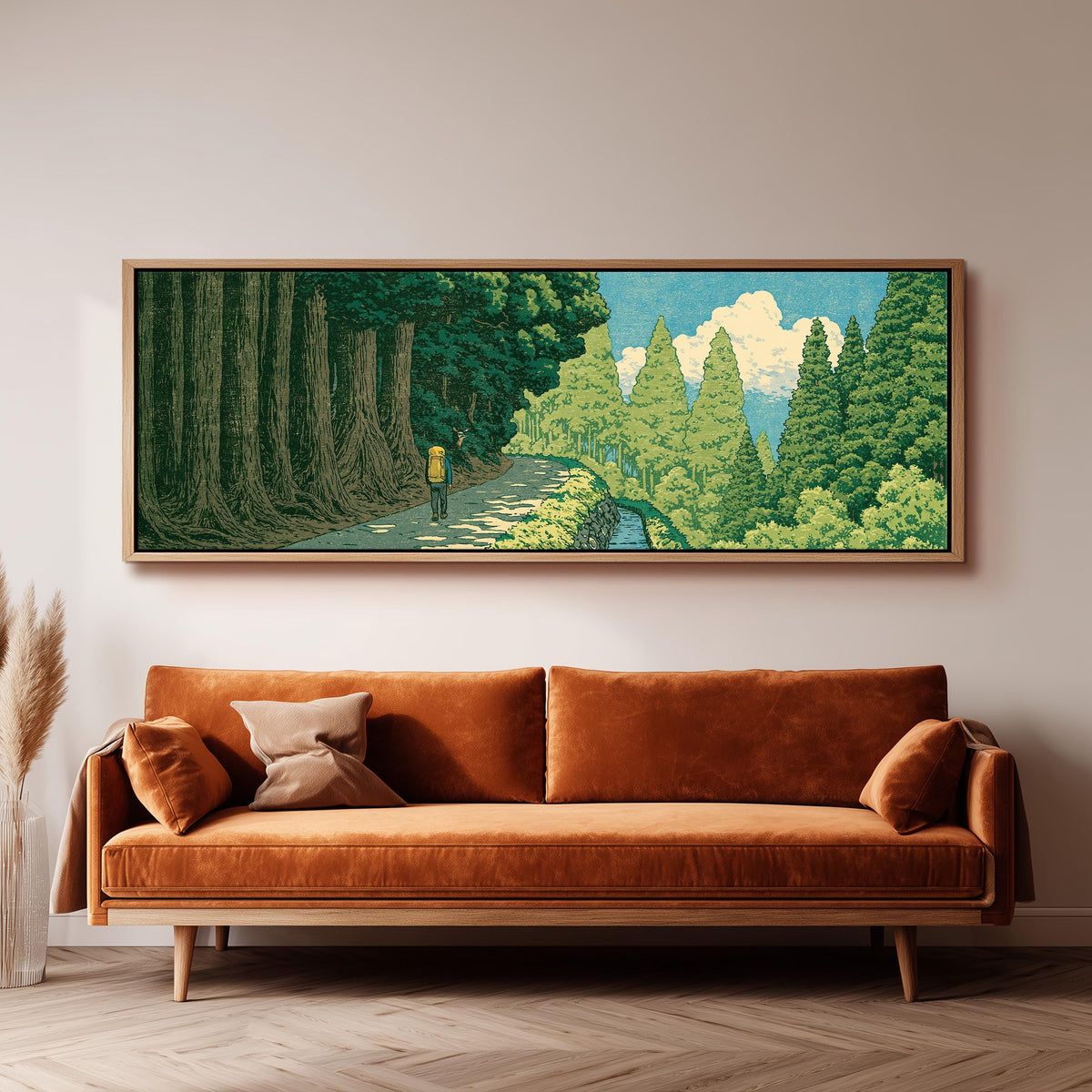 Hiker on a forest trail wide panoramic canvas print above a bench in a dark living room