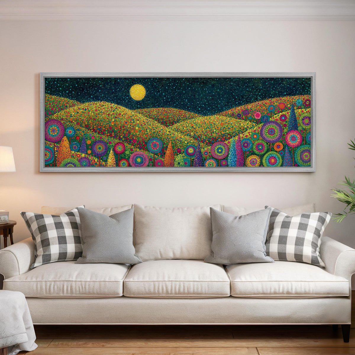 Moonlit flower hills panoramic canvas print above a white sofa in a bright living room
