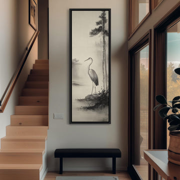 a hallway with a large black and white painting of a crane on the wall, a wooden staircase, a bench, and a plant.