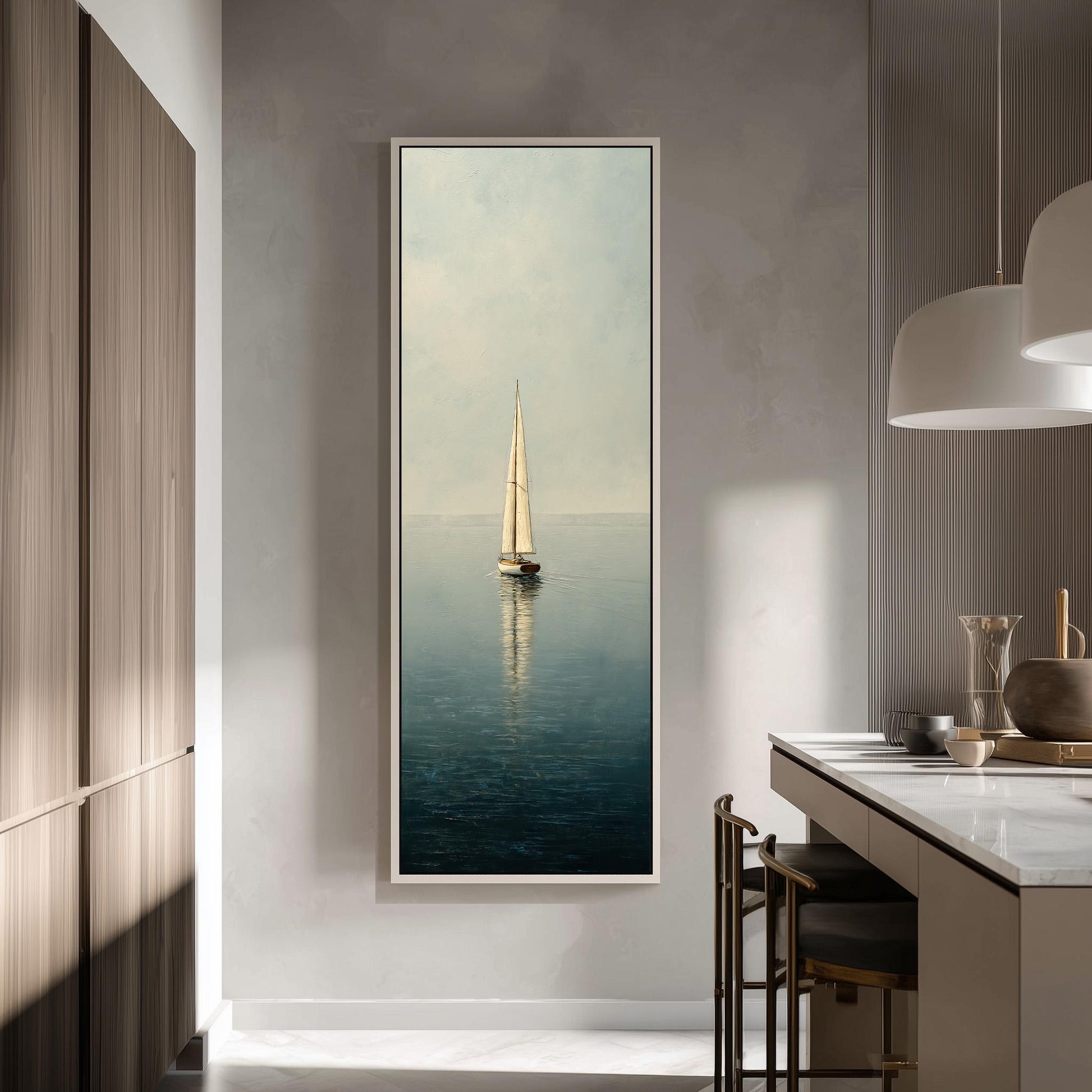 a large framed painting of a sailboat on the water, hanging on a wall in a modern kitchen.