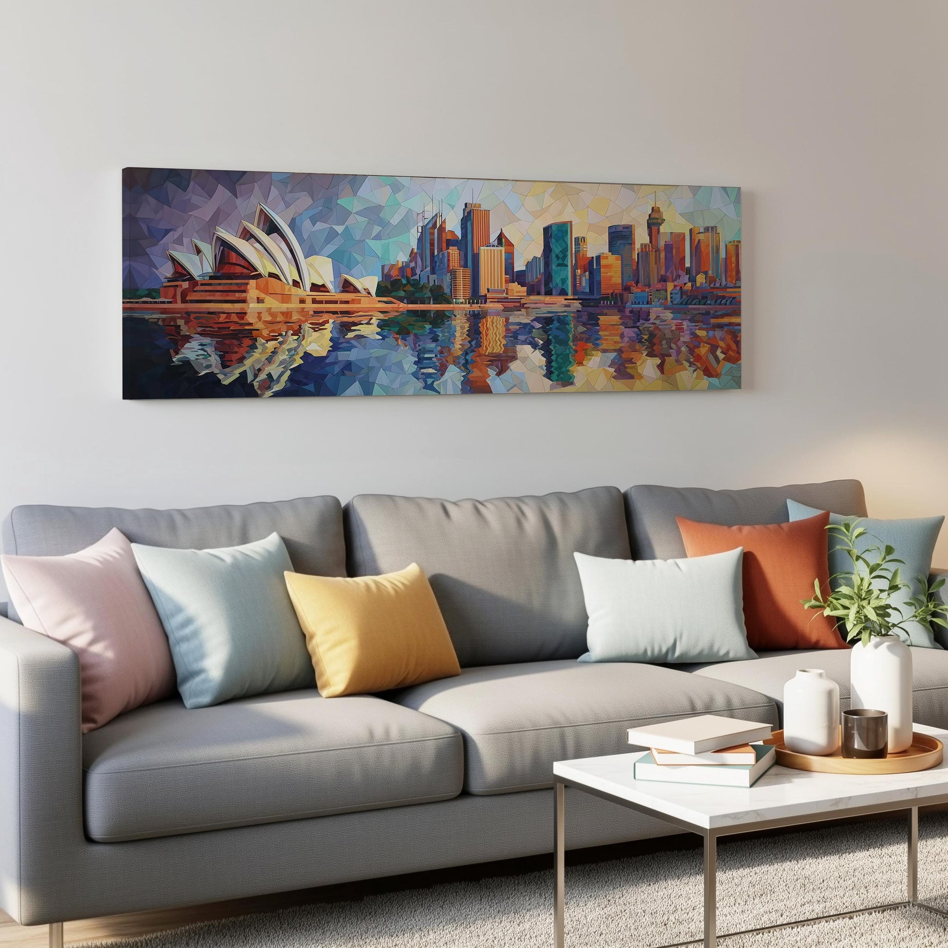 a modern living room with a gray sofa adorned with colorful throw pillows, a white coffee table, and a large painting of the Sydney Opera House hanging on the wall above the sofa.
