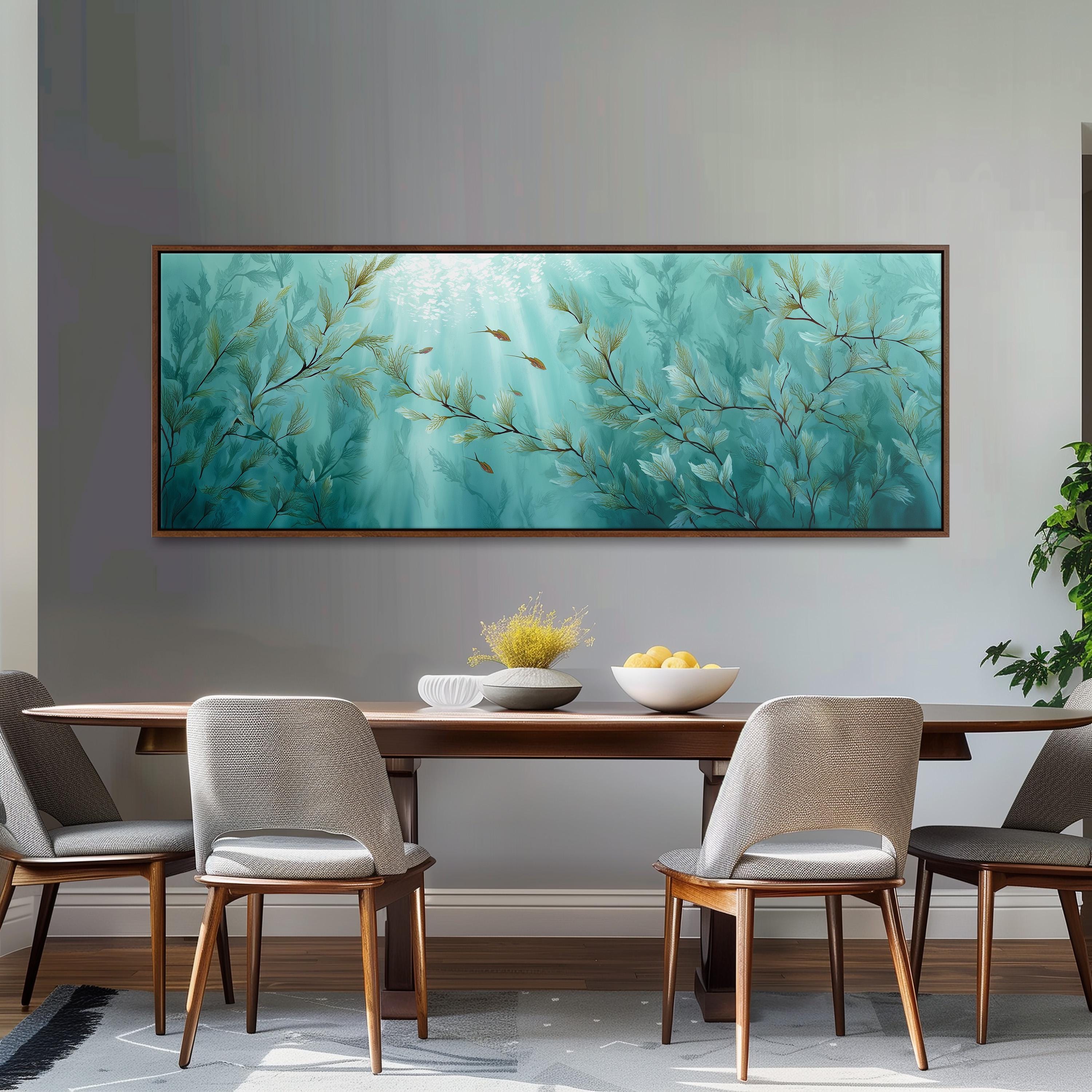 a dining room with a large painting of underwater plants hanging on the wall above a wooden table with four chairs. The table is set with a bowl of fruit and a vase of flowers, creating a cozy and inviting atmosphere.