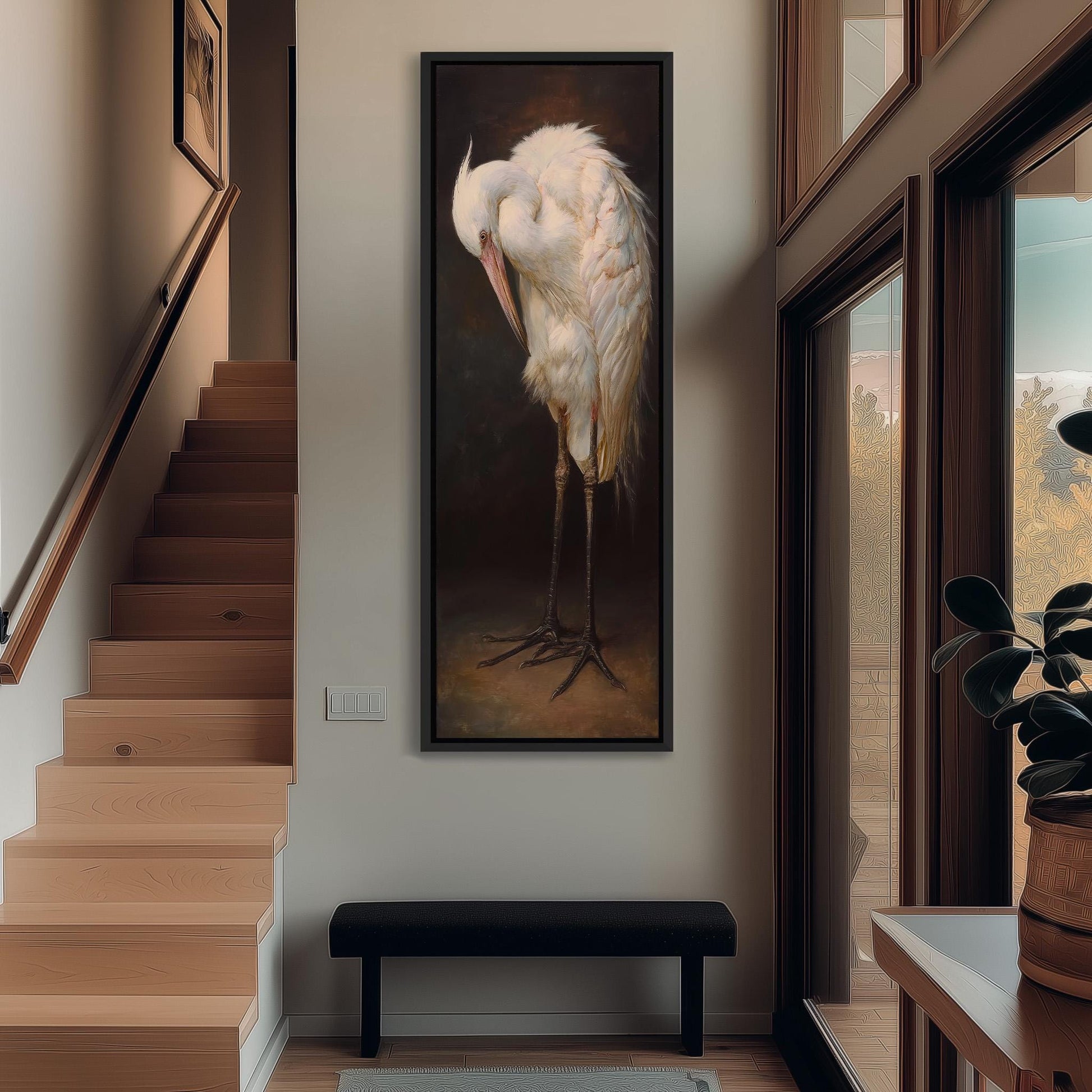 a large painting of a white crane standing on one leg, hanging on a wall in a hallway.