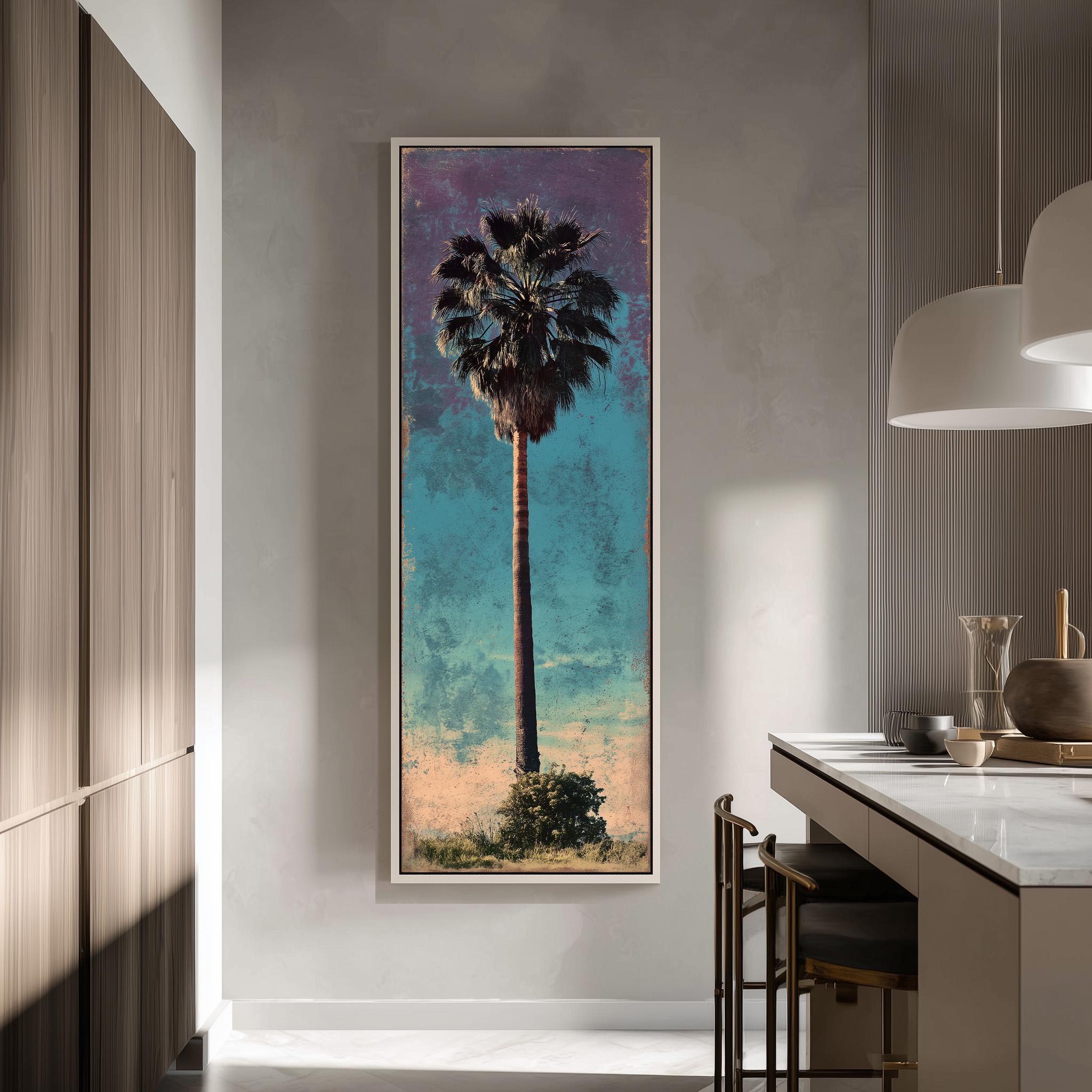 a large framed painting of a palm tree hanging on a wall in a modern kitchen.