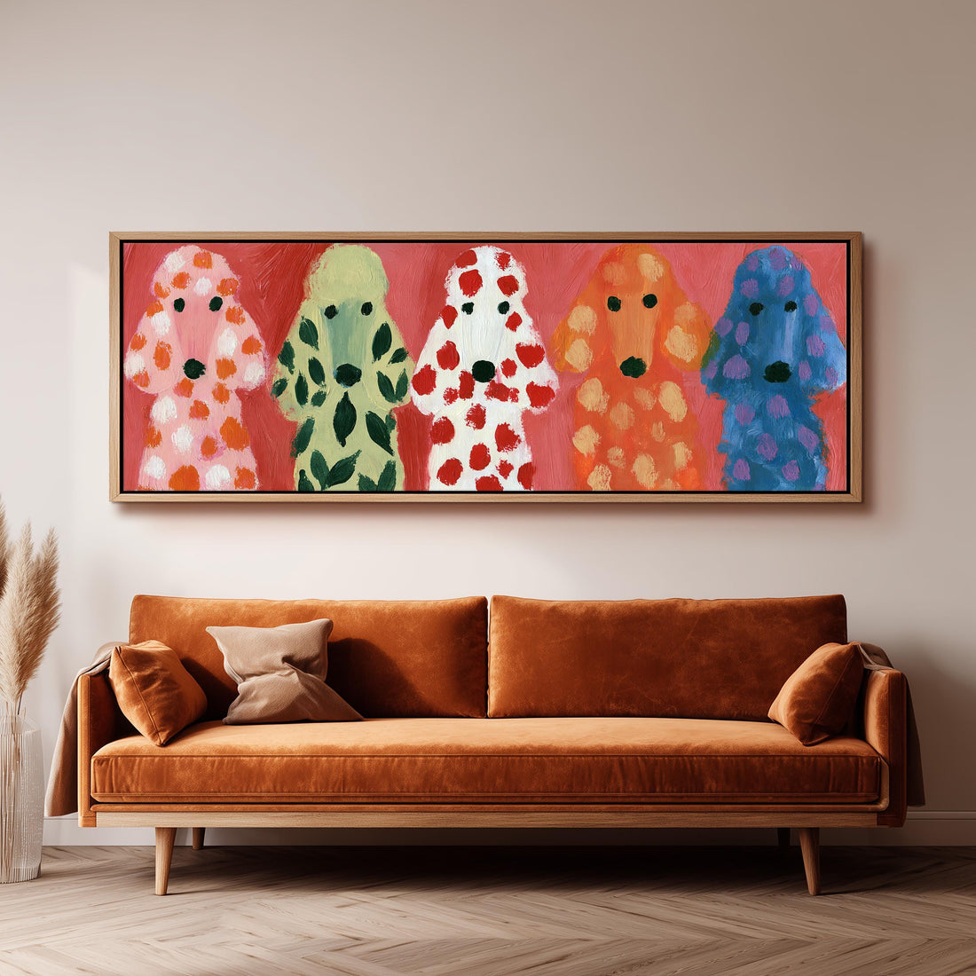 Five colorful poodles long horizontal canvas print above a sofa in a living room