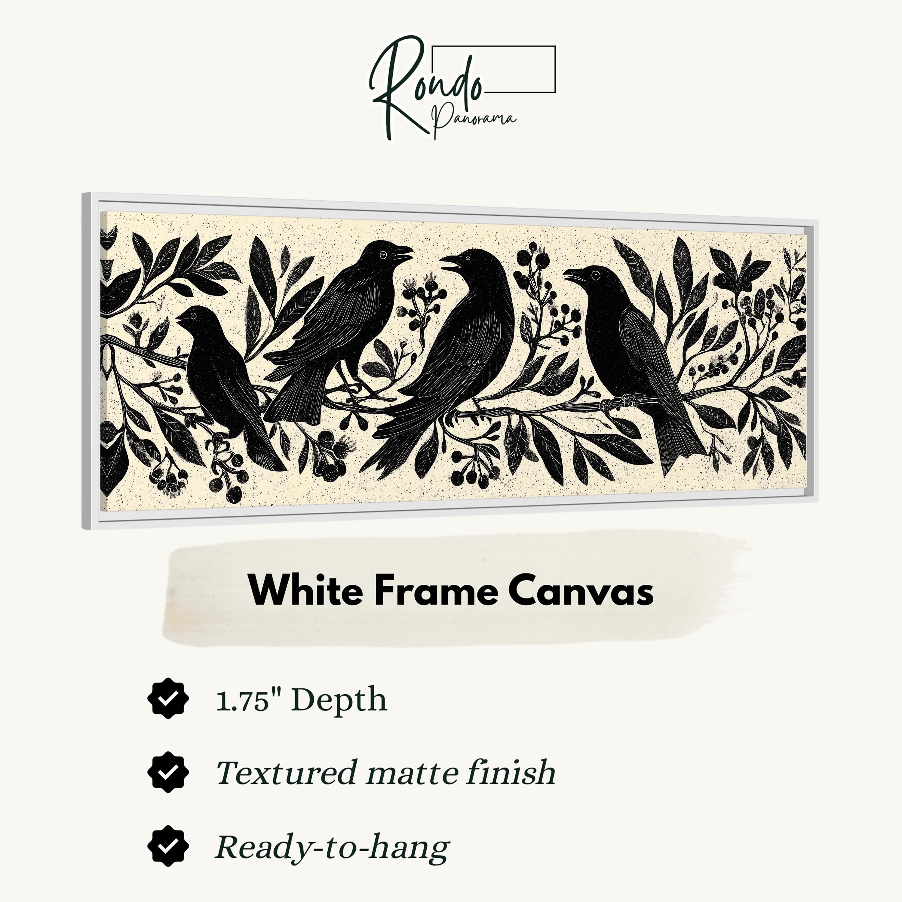 a white frame canvas with a black and white illustration of four birds perched on branches with leaves and berries.