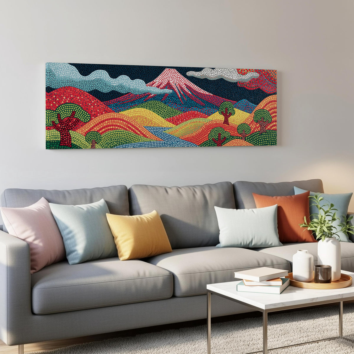 Mount Fuji above rainbow dotted hills panoramic canvas print above a grey sofa in a living room