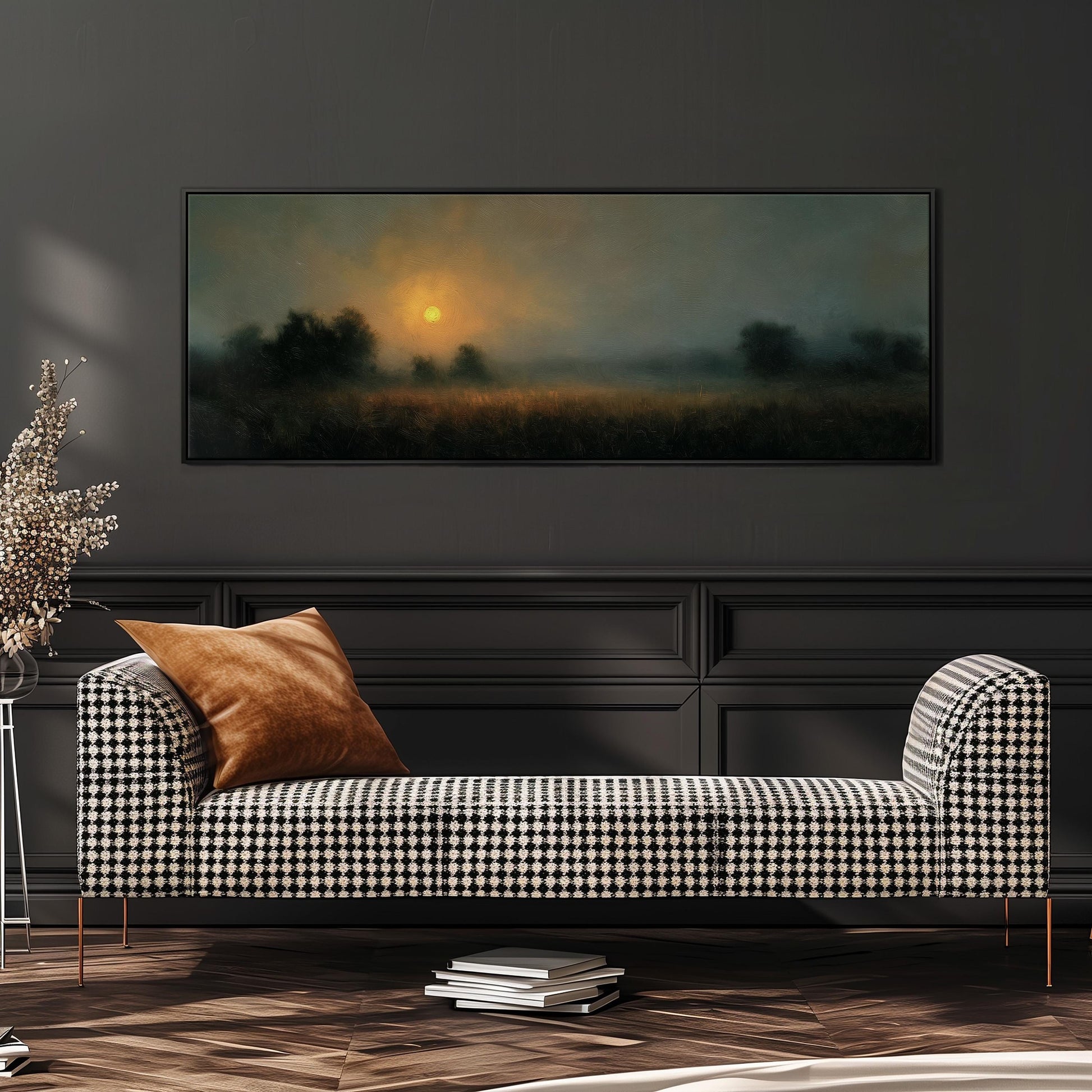 a black and white checkered sofa with a brown throw pillow, positioned in front of a large painting depicting a serene landscape with a sunset.