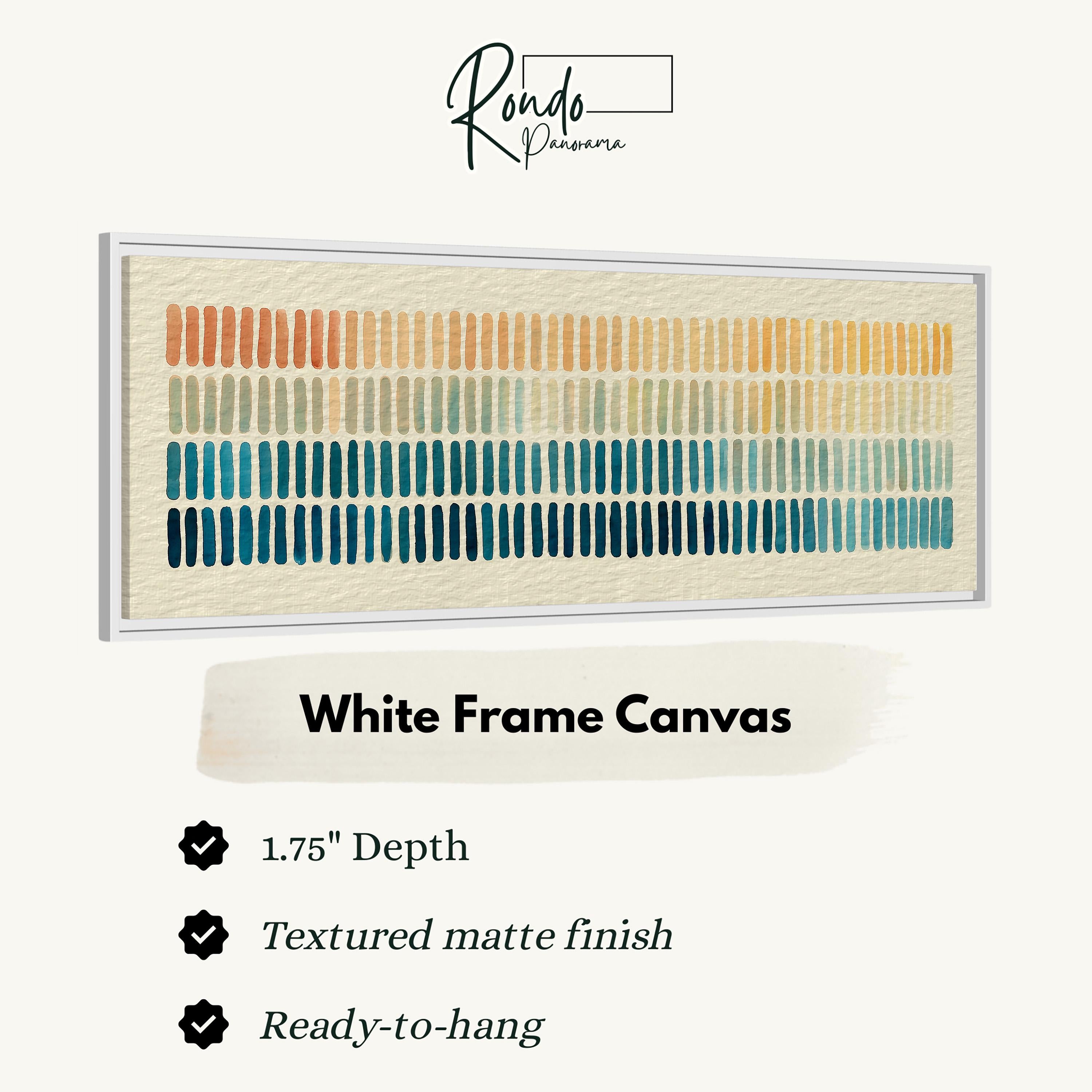 a white frame canvas with a repeating pattern of vertical lines in various colors, including shades of orange, green, blue, and yellow. The canvas has a 1.75" depth and is textured with a matte finish. It is ready to hang and is described as a "White Frame Canvas" with a "Textured matte finish".