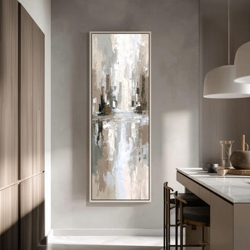 a modern kitchen with a large abstract painting hanging on the wall above a countertop with barstools.