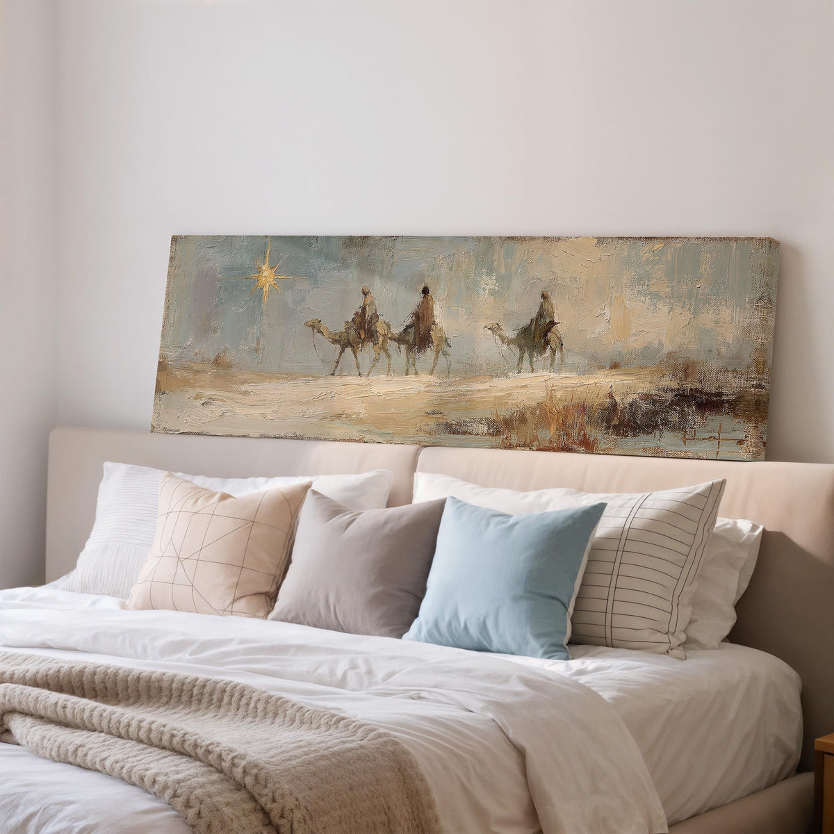 Wise men on camels following the star wide panoramic canvas print above a bed in a bedroom