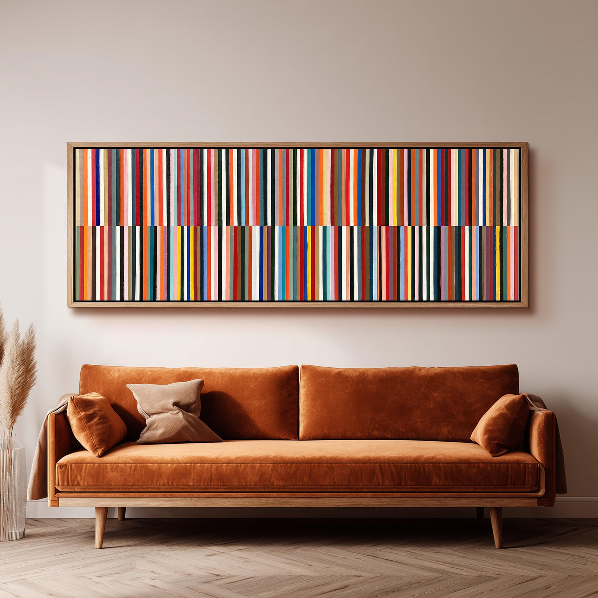 Two bands of colorful stripes panoramic canvas print above a sofa in a living room