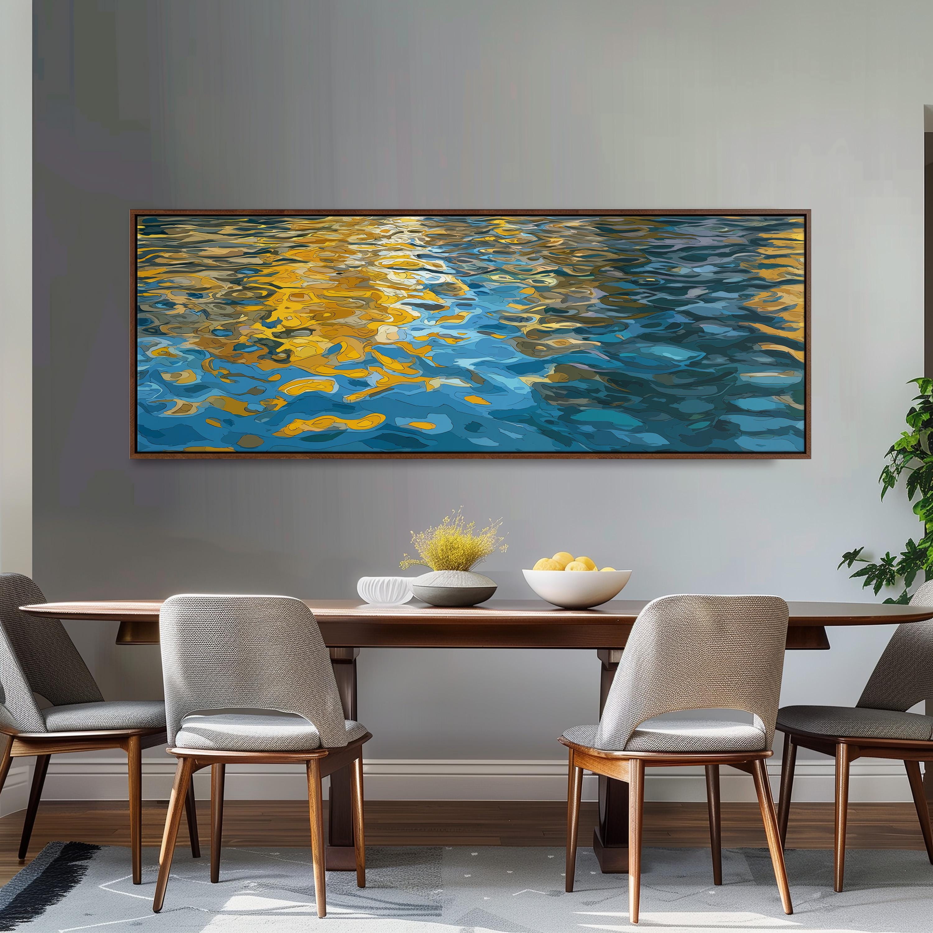a dining room with a large painting of a serene body of water hanging on the wall above a wooden dining table with four chairs. The table is set with a bowl of fruit and a vase of flowers, creating a warm and inviting atmosphere.