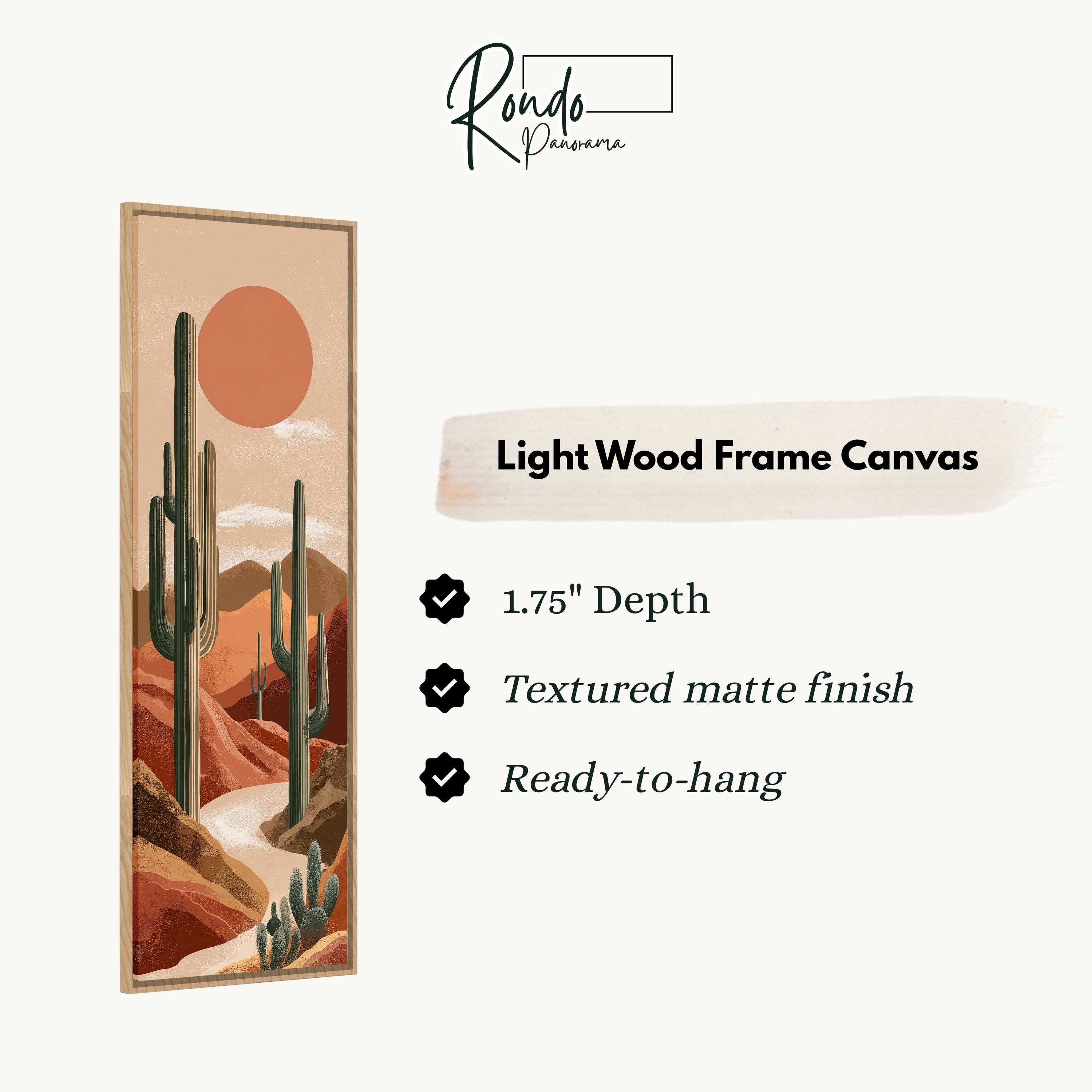 The image is a light wood frame canvas depicting a desert landscape with cacti and mountains.