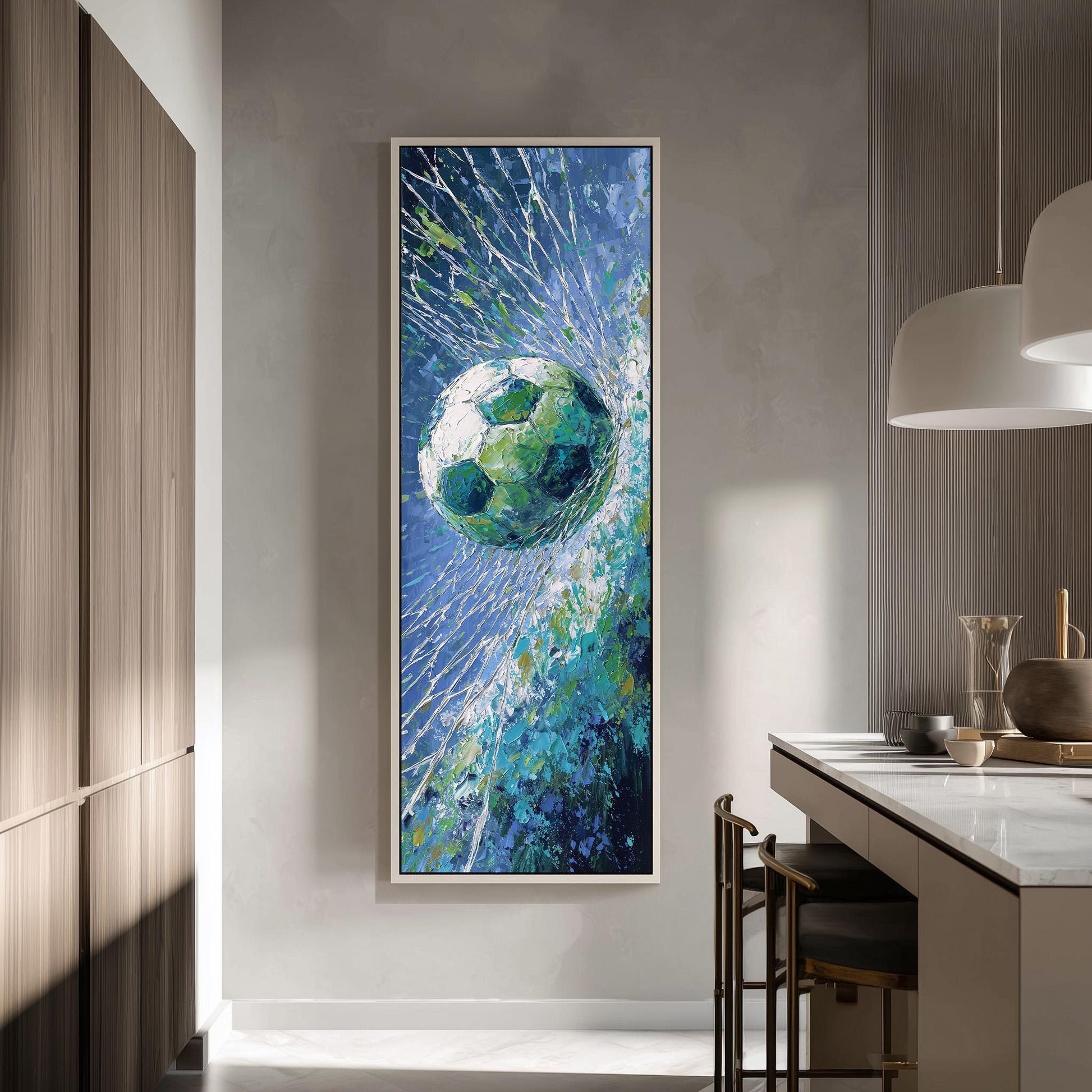 a large framed painting of a soccer ball in mid-air, surrounded by a vibrant blue and green background.