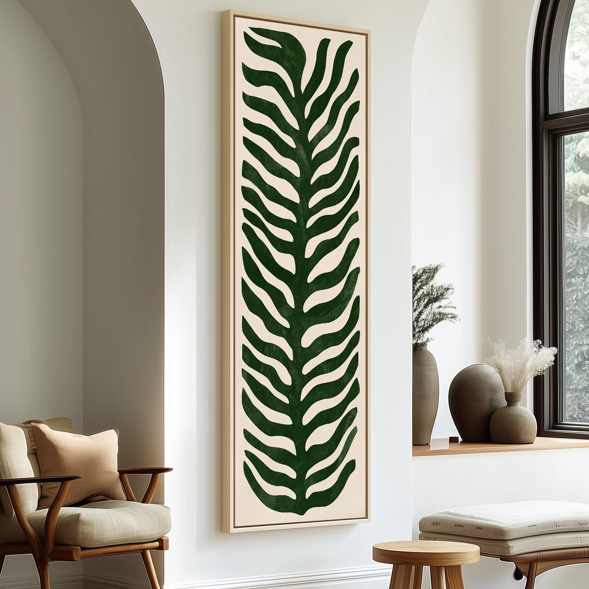 Stylized dark green fern leaf long vertical canvas print in a sunlit living space